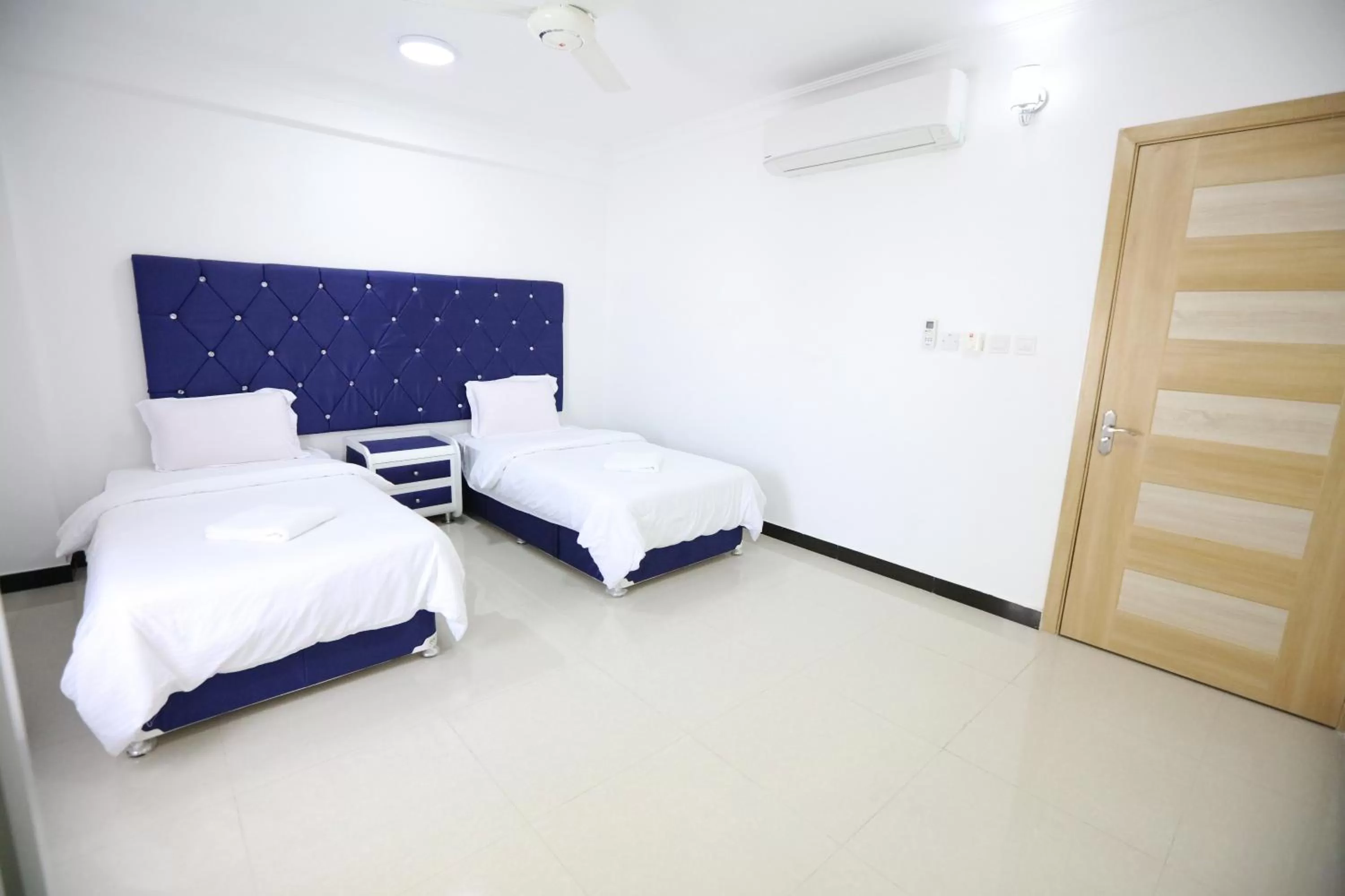 Bed in Al Rayyan Hotel Apartments Muscat