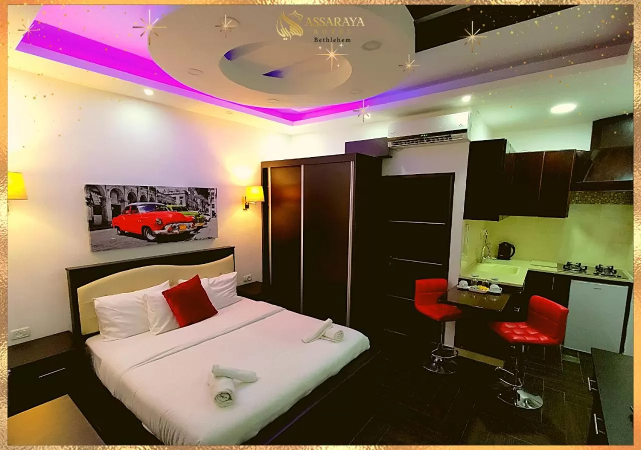 Photo of the whole room, Bed in Assaraya Palace Hotel