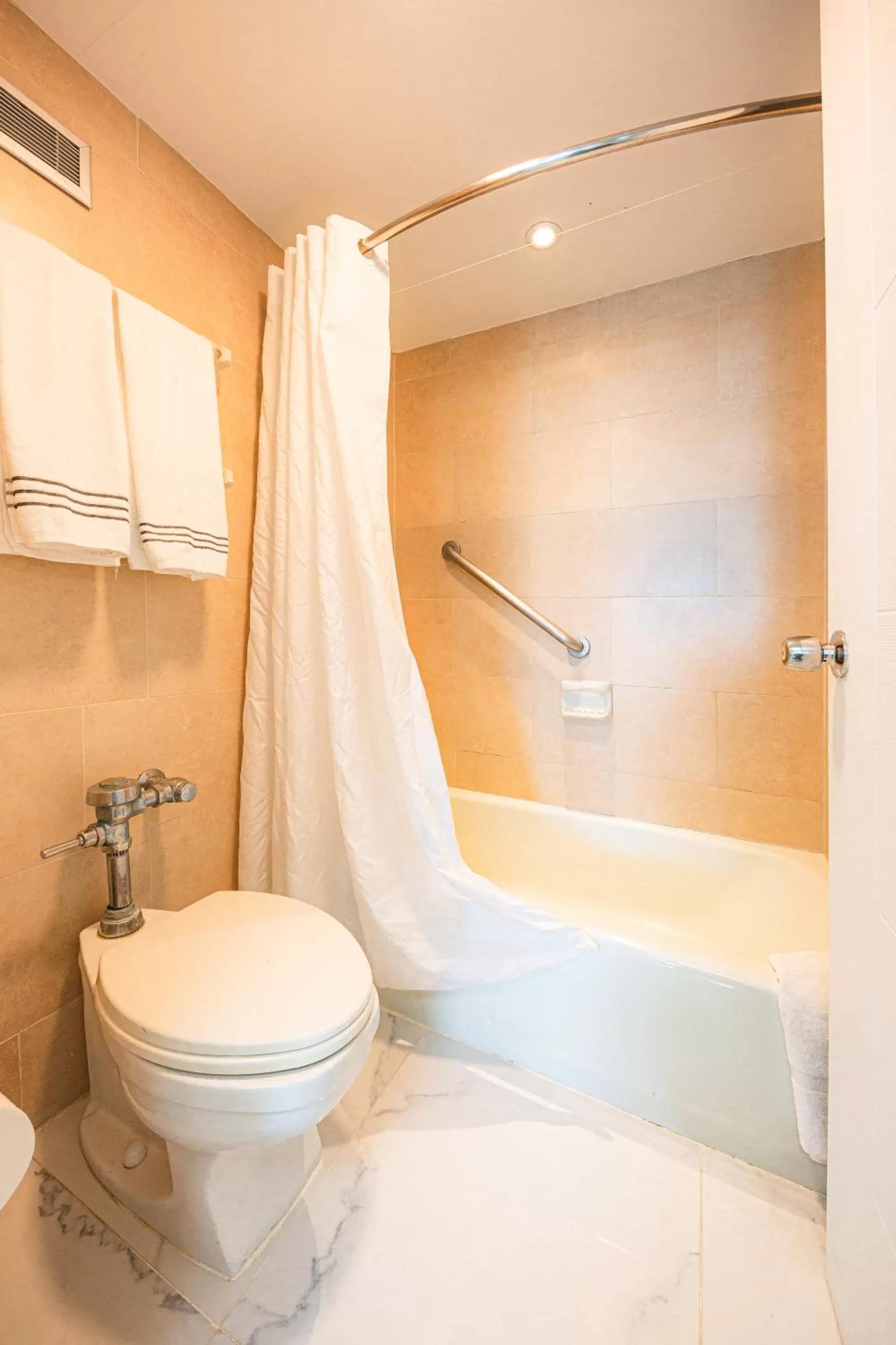 Bathroom in ESJ Towers by Chana