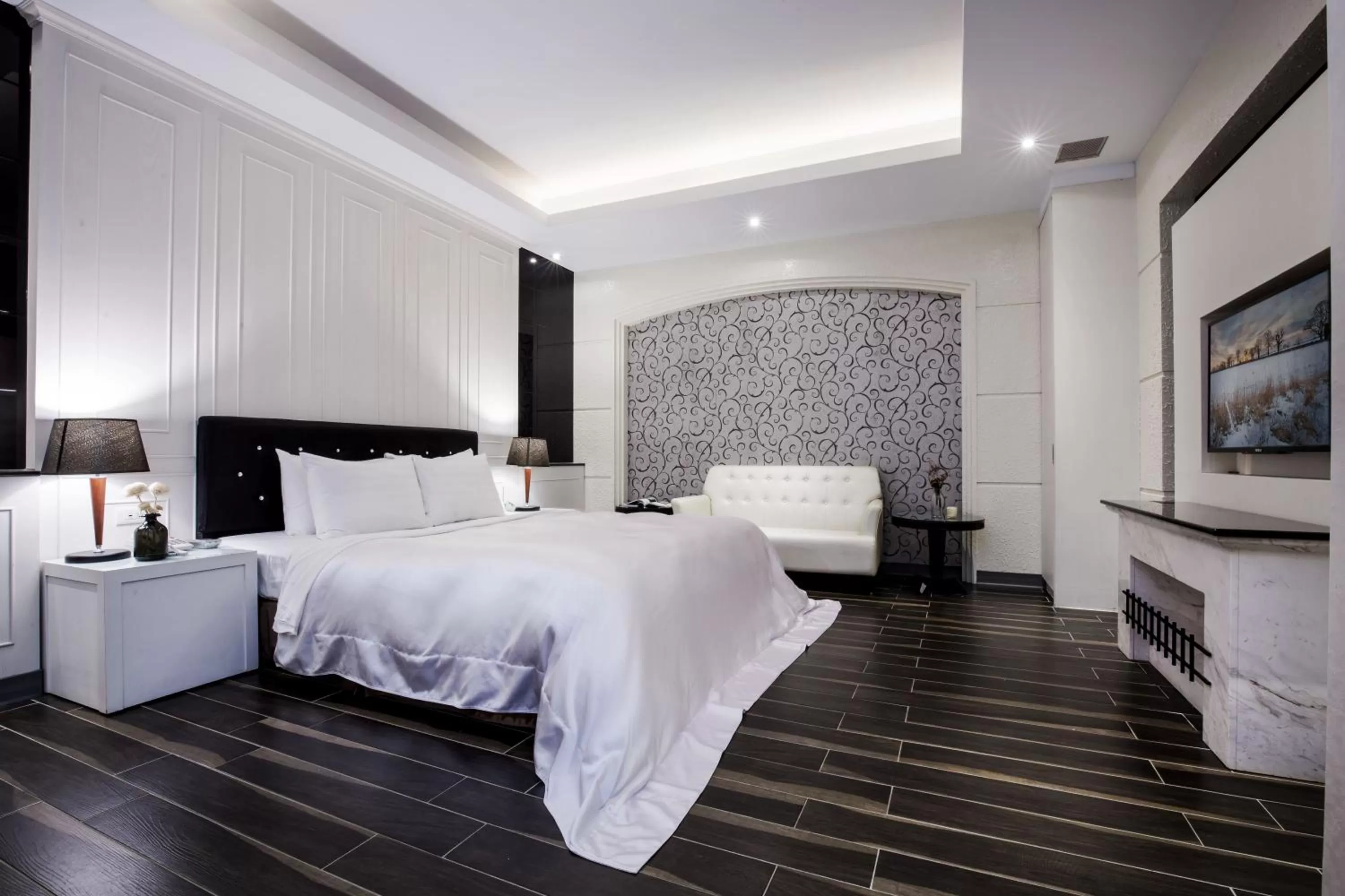 Bed in Duo Romance Hotel