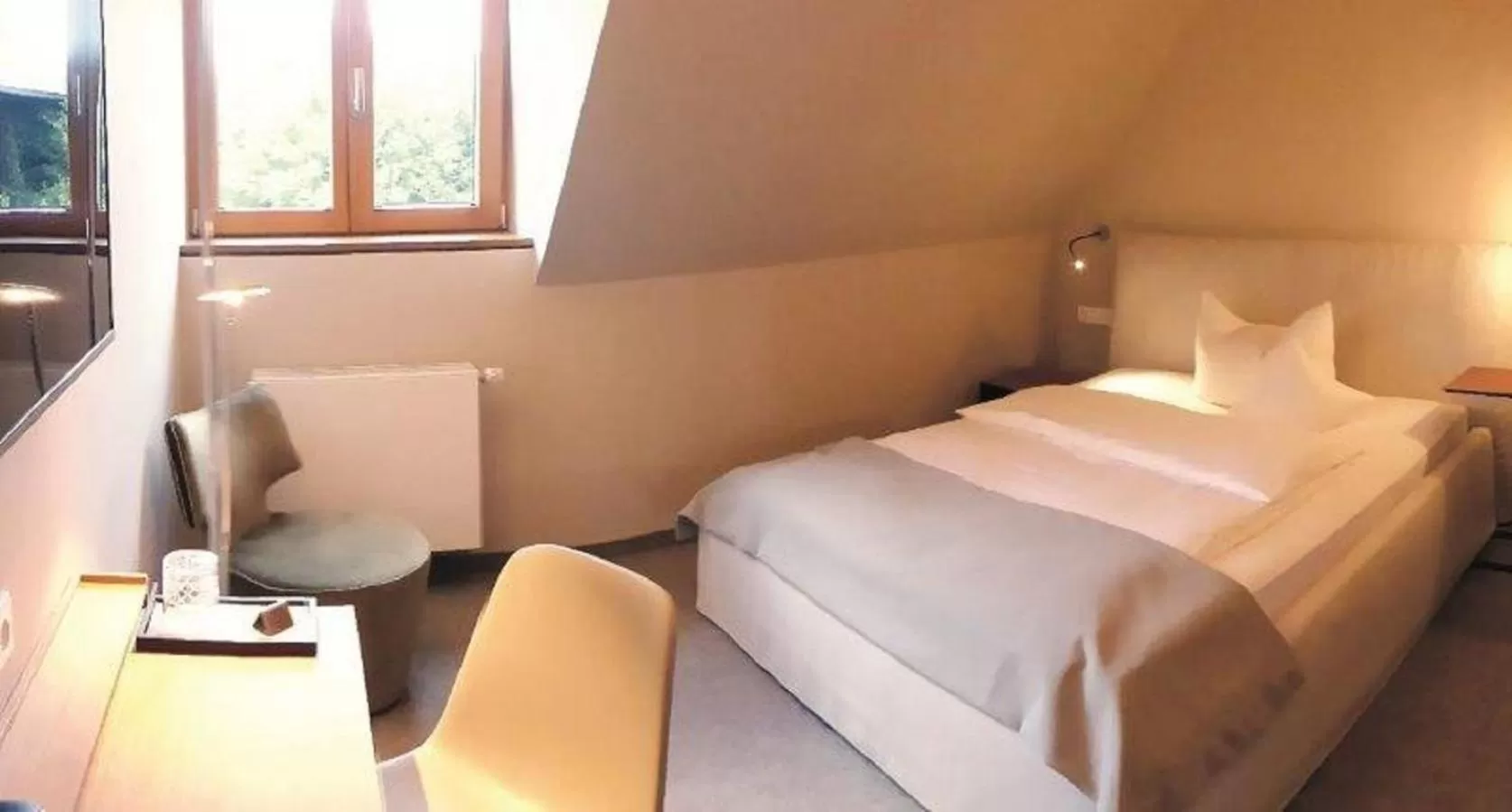 Bed in Berghotel Sammüller