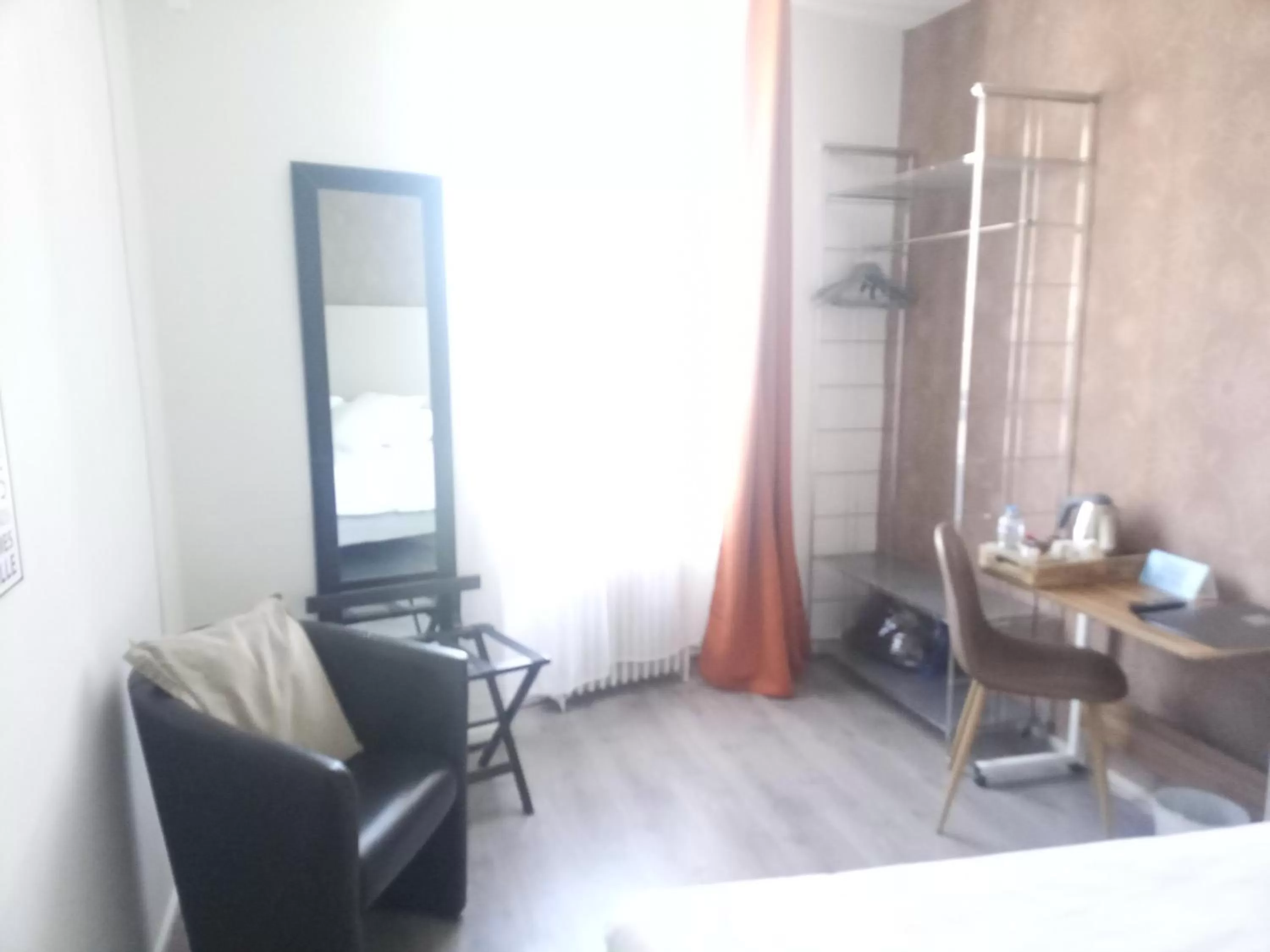 Seating area in Logis Hôtel La Bastide des Oliviers