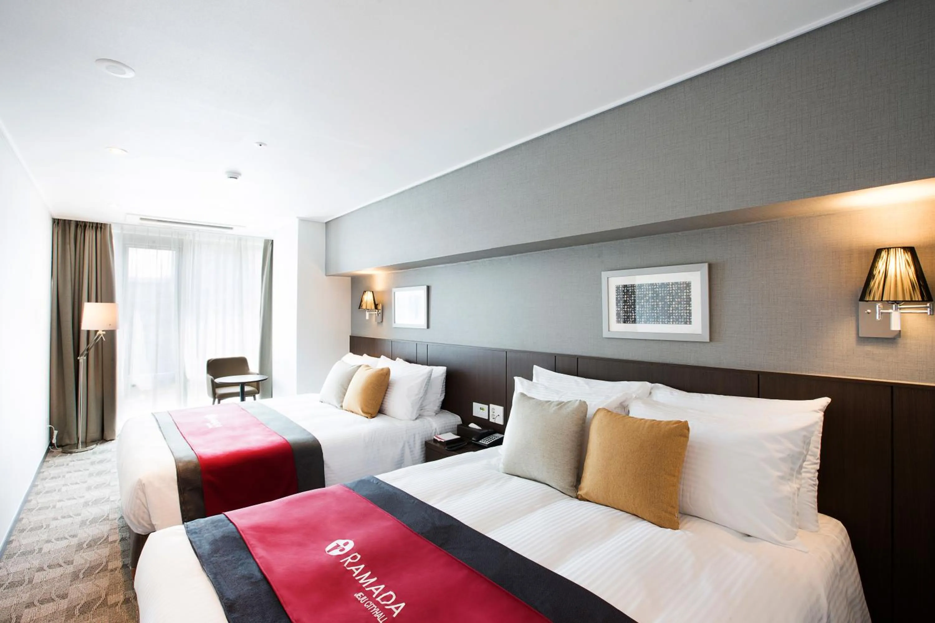 Bed in Ramada by Wyndham Jeju City Hall