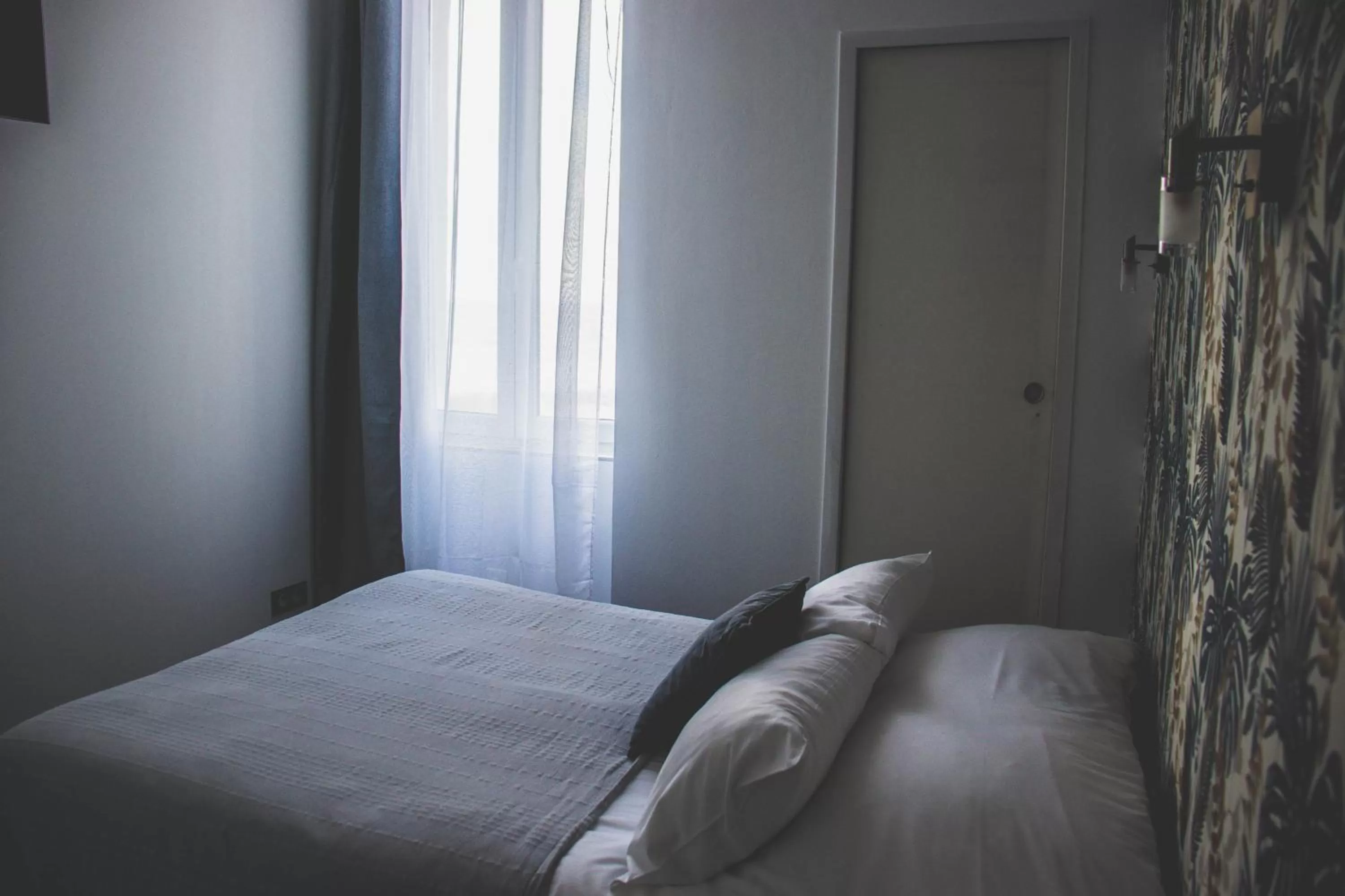 Bed in Hôtel Restaurant L'Atelier des Cousins