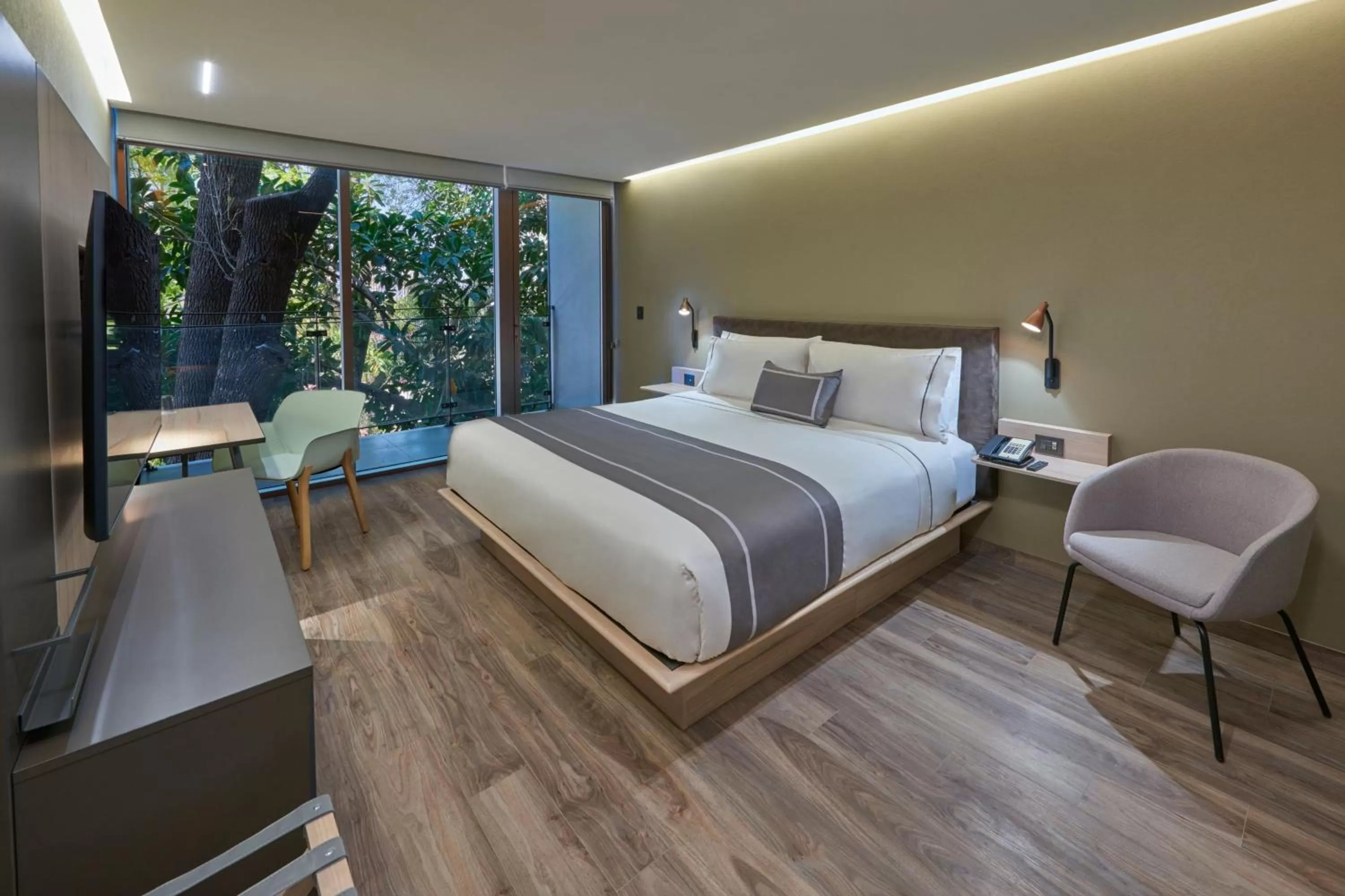 Photo of the whole room, Bed in City Express Plus by Marriott Guadalajara Providencia