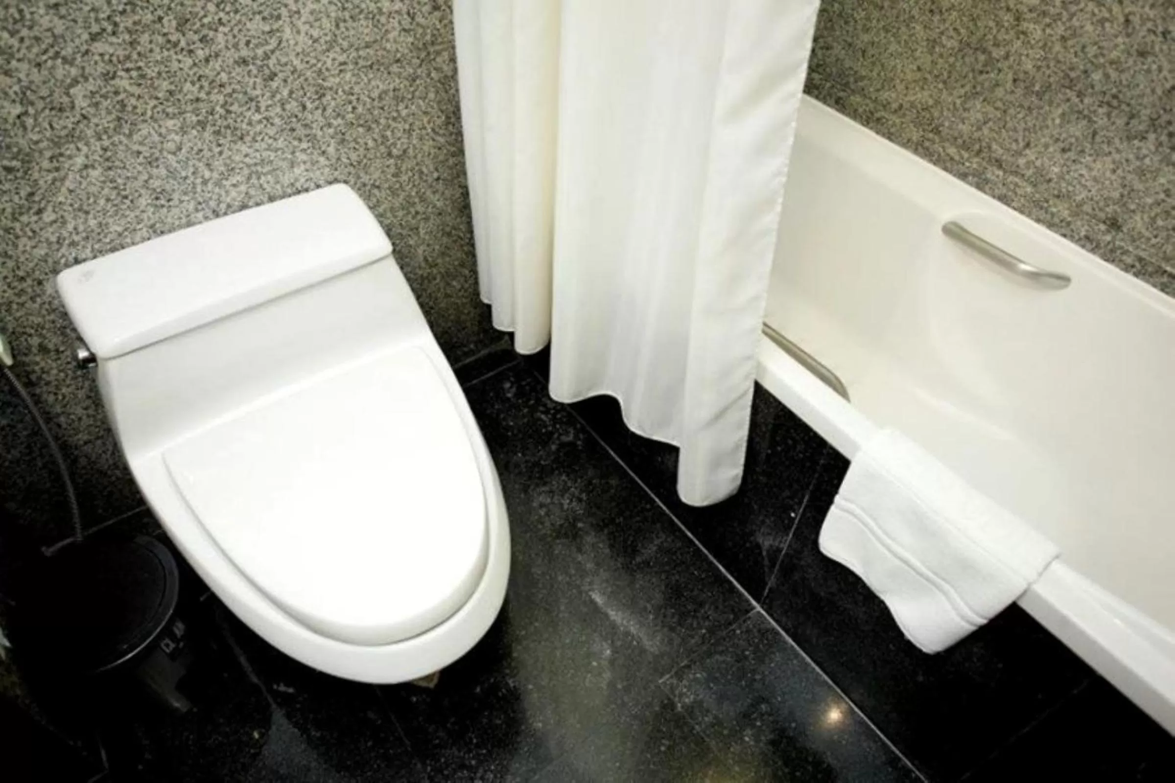 Bathroom in Majestic Suites Hotel