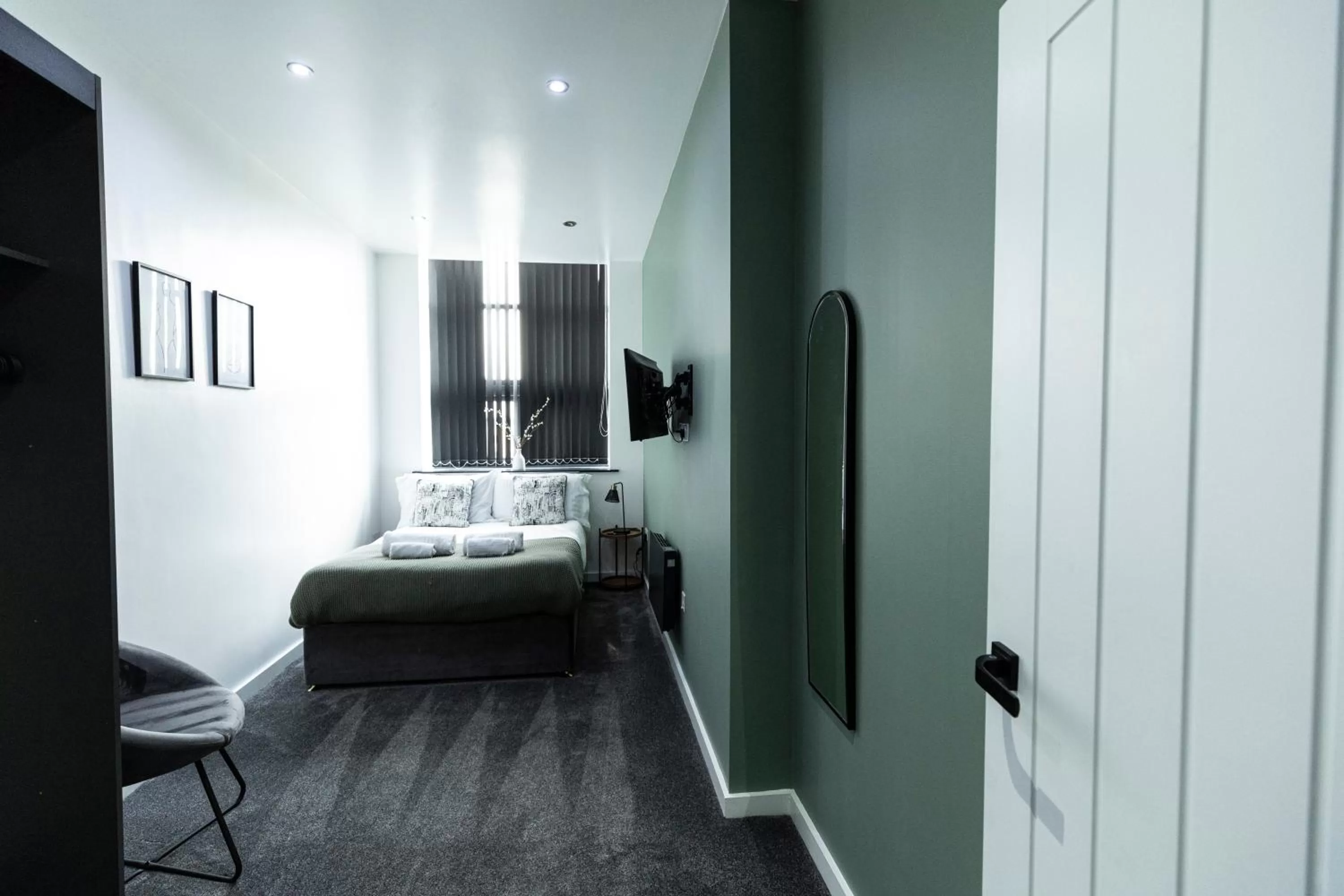 Bed in Spire Accommodations Ltd