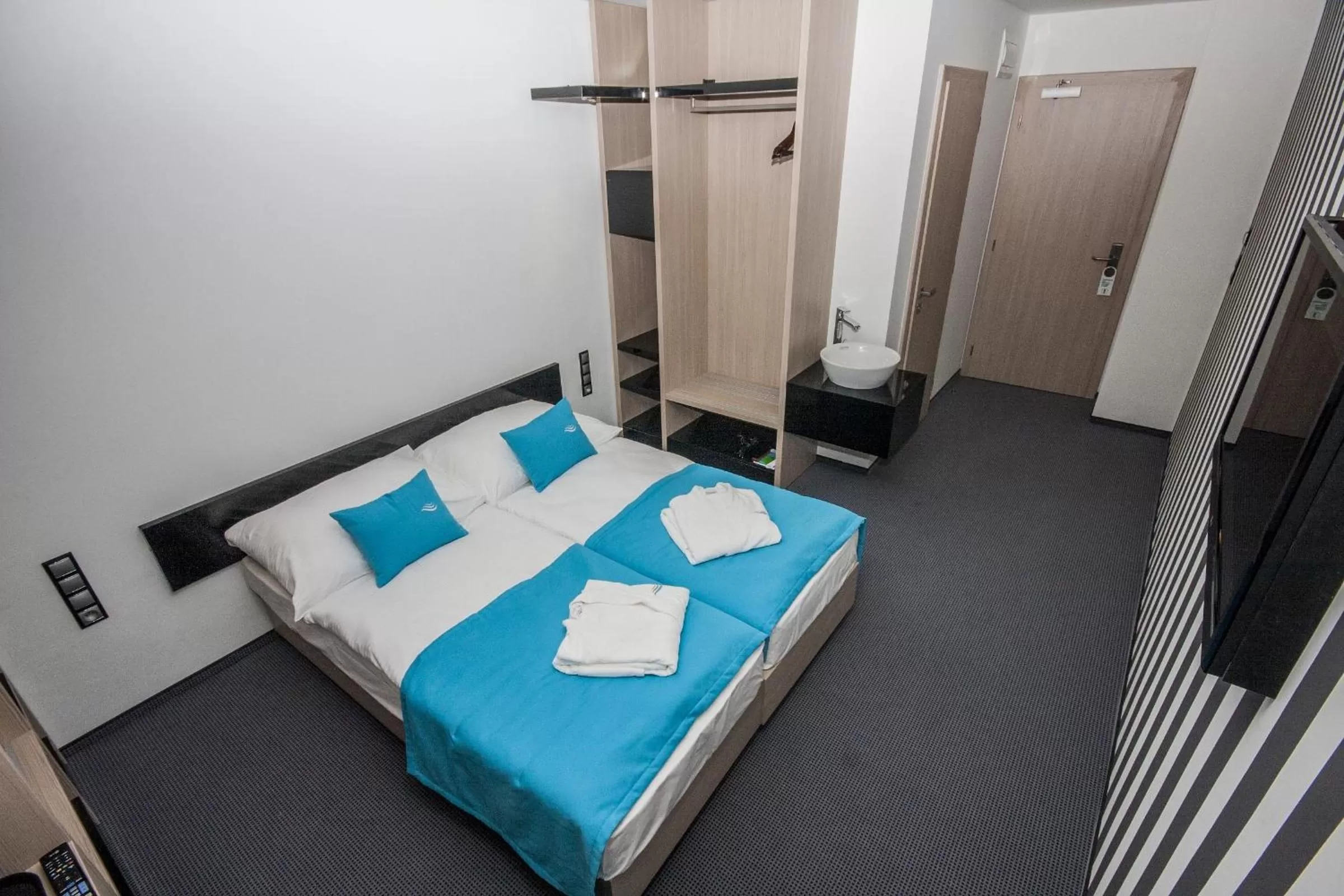 Bed in Hotel AquaCity Riverside