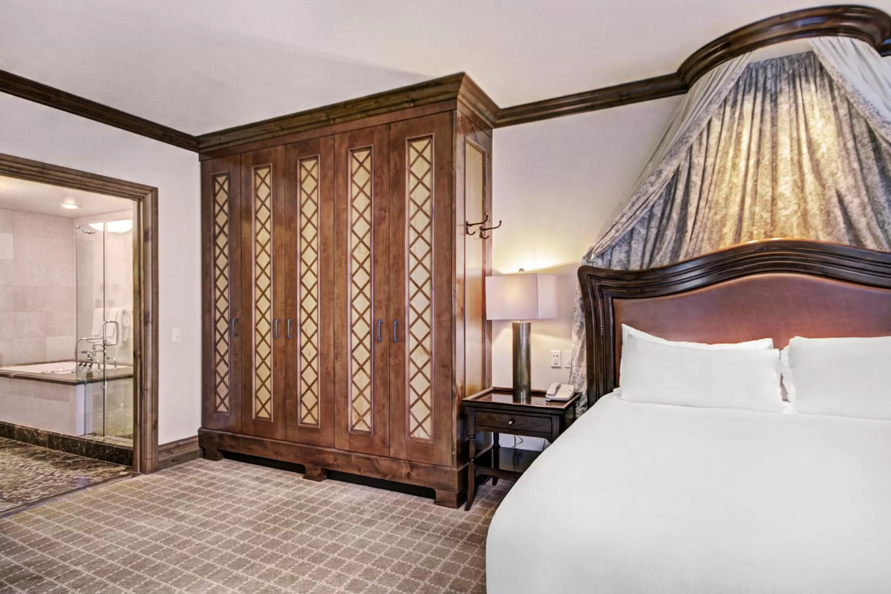 Bed in The Arrabelle at Vail Square, a RockResort, by Vail Resorts