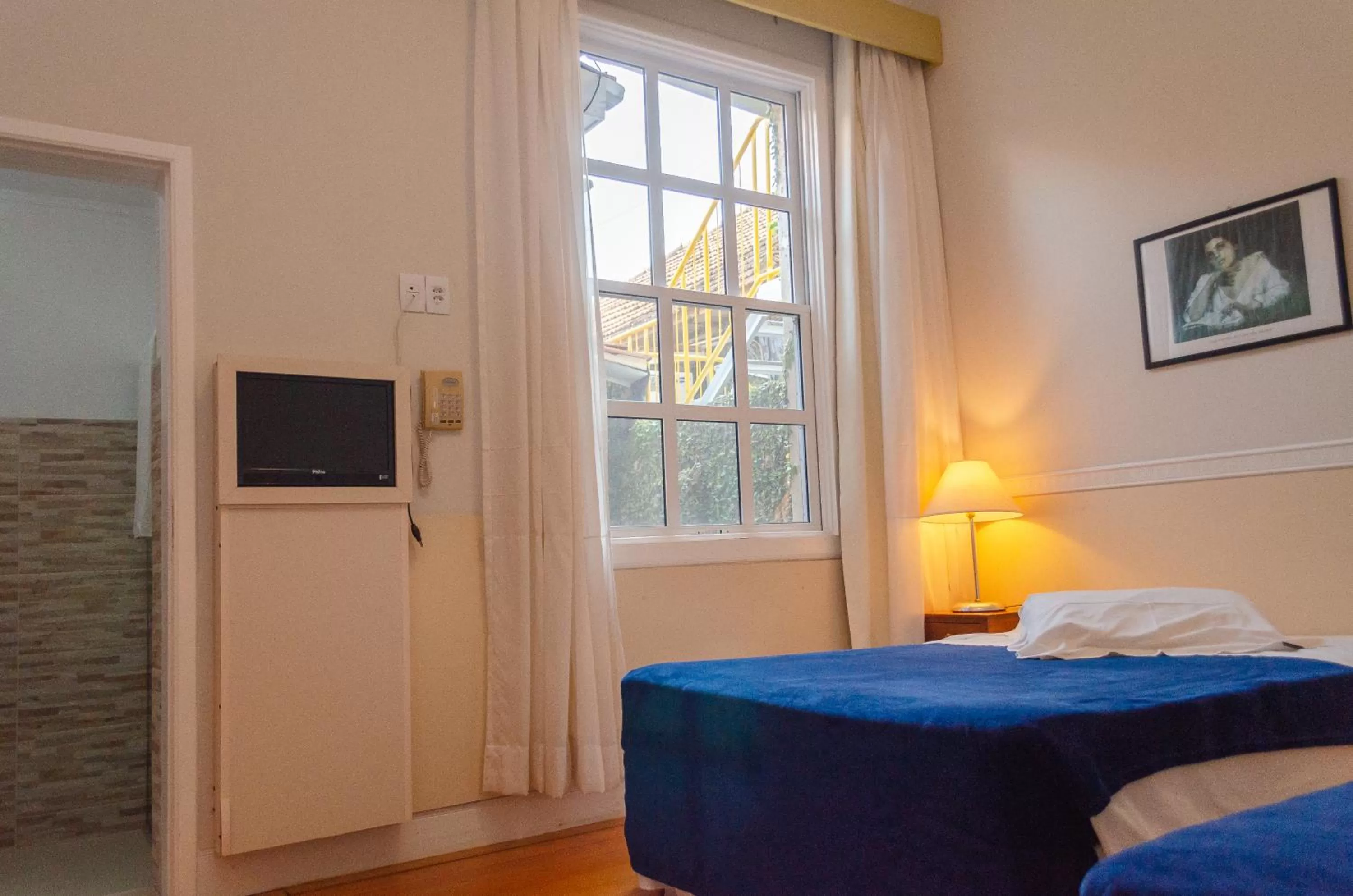 Bed in Central Palace Hotel