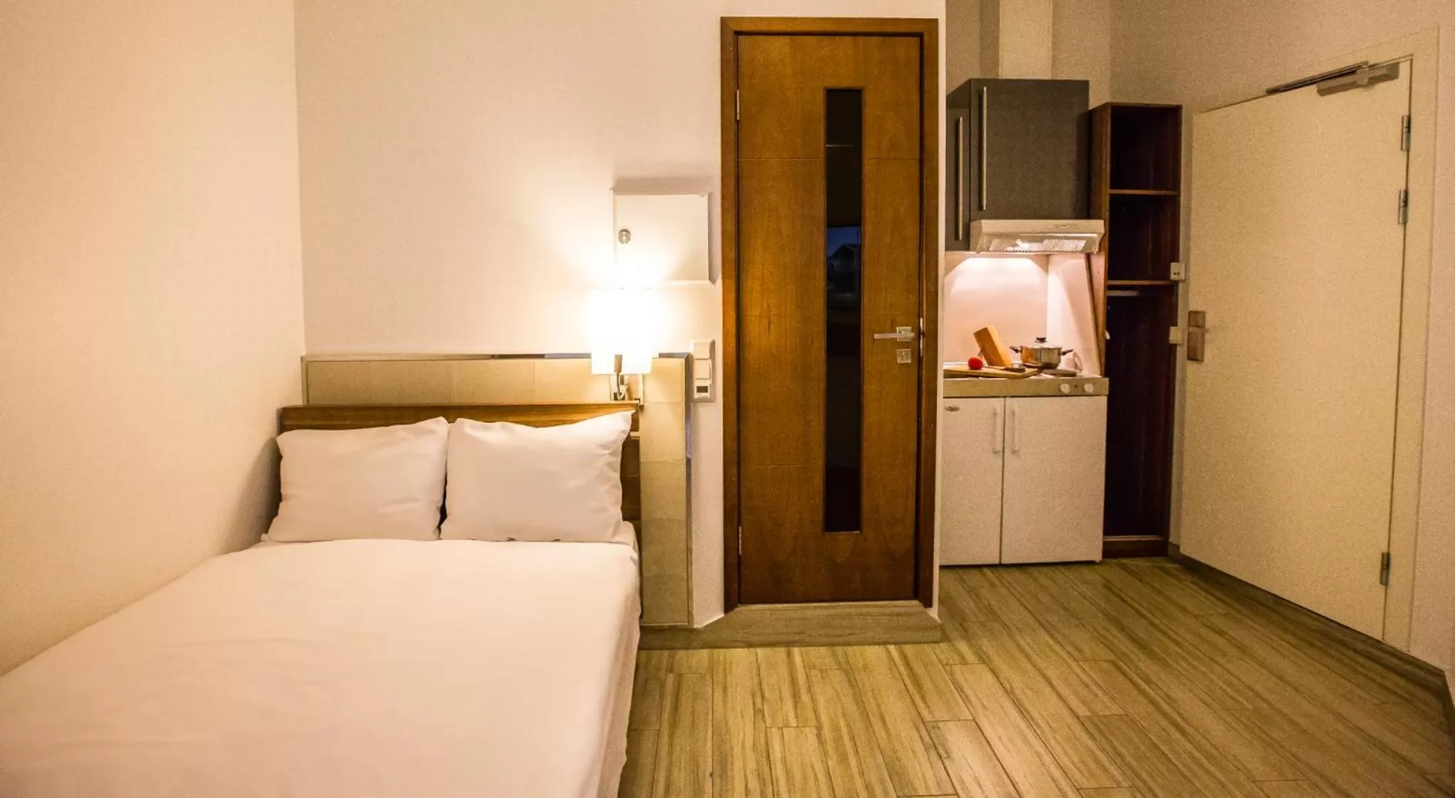 Bedroom, Bed in Central City Apartments