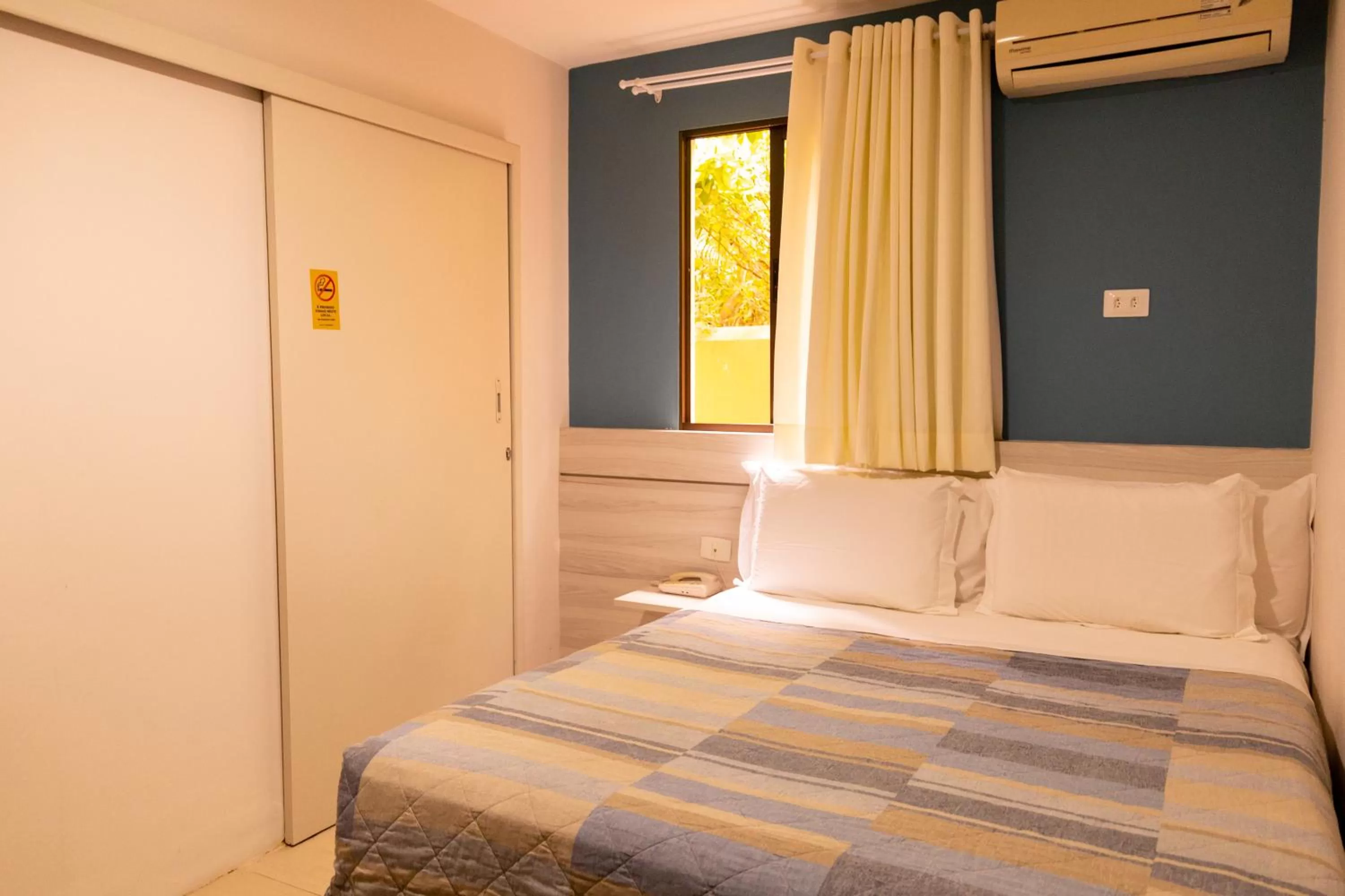 Bed in Pousada Mariluz