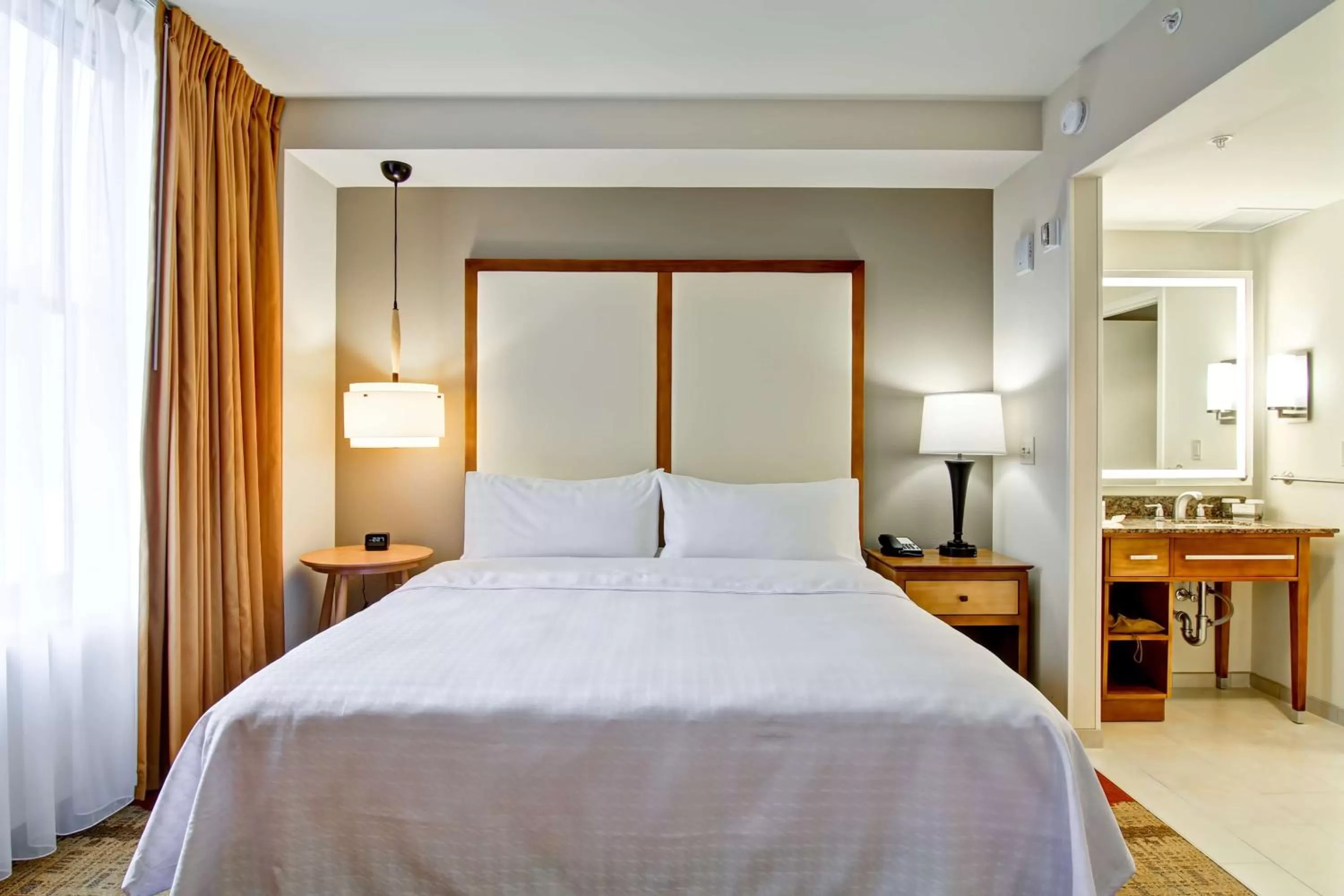 Bed in Homewood Suites by Hilton Cincinnati-Downtown