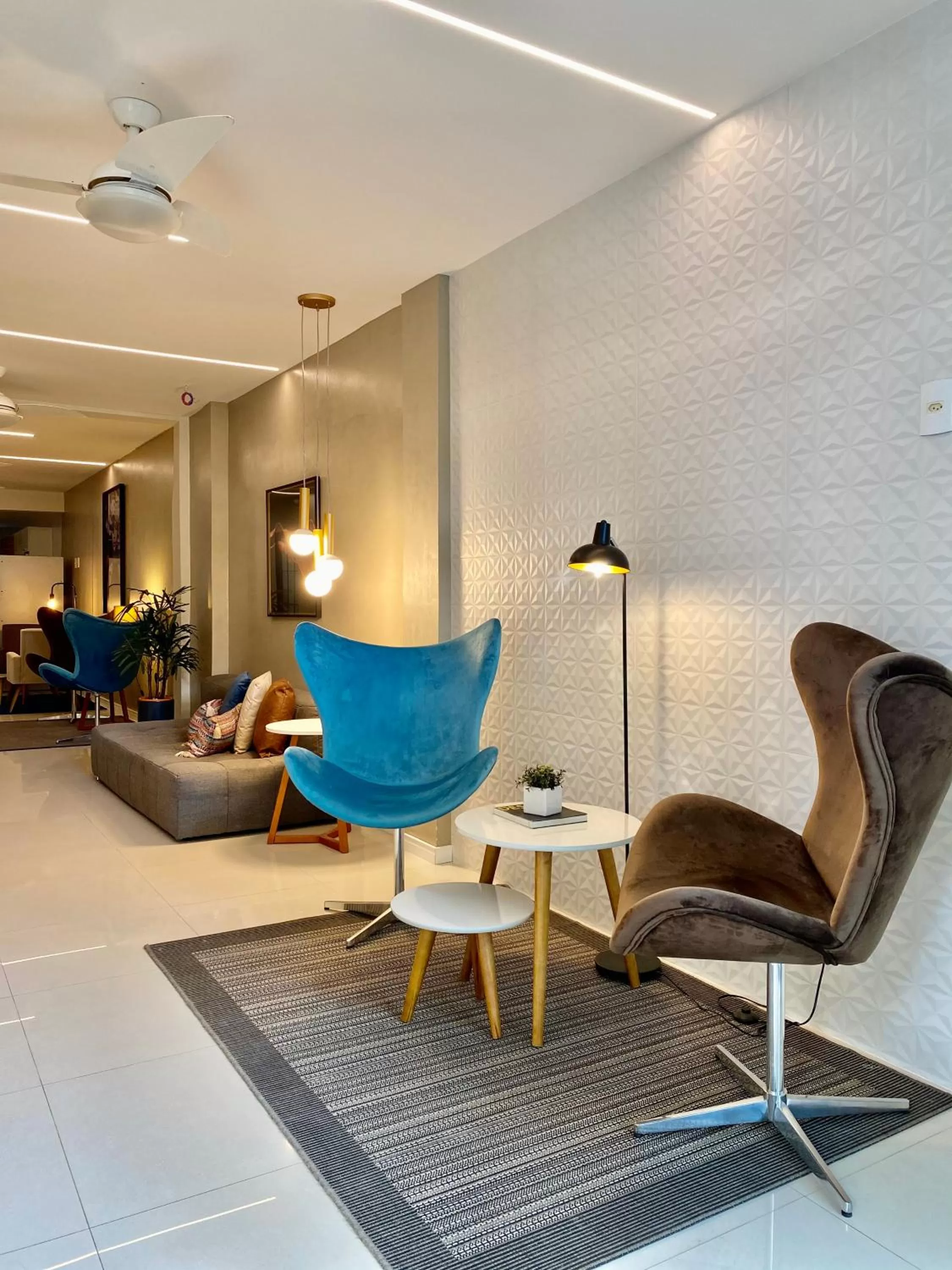 Communal lounge/ TV room in Injoy Suítes & Aparts