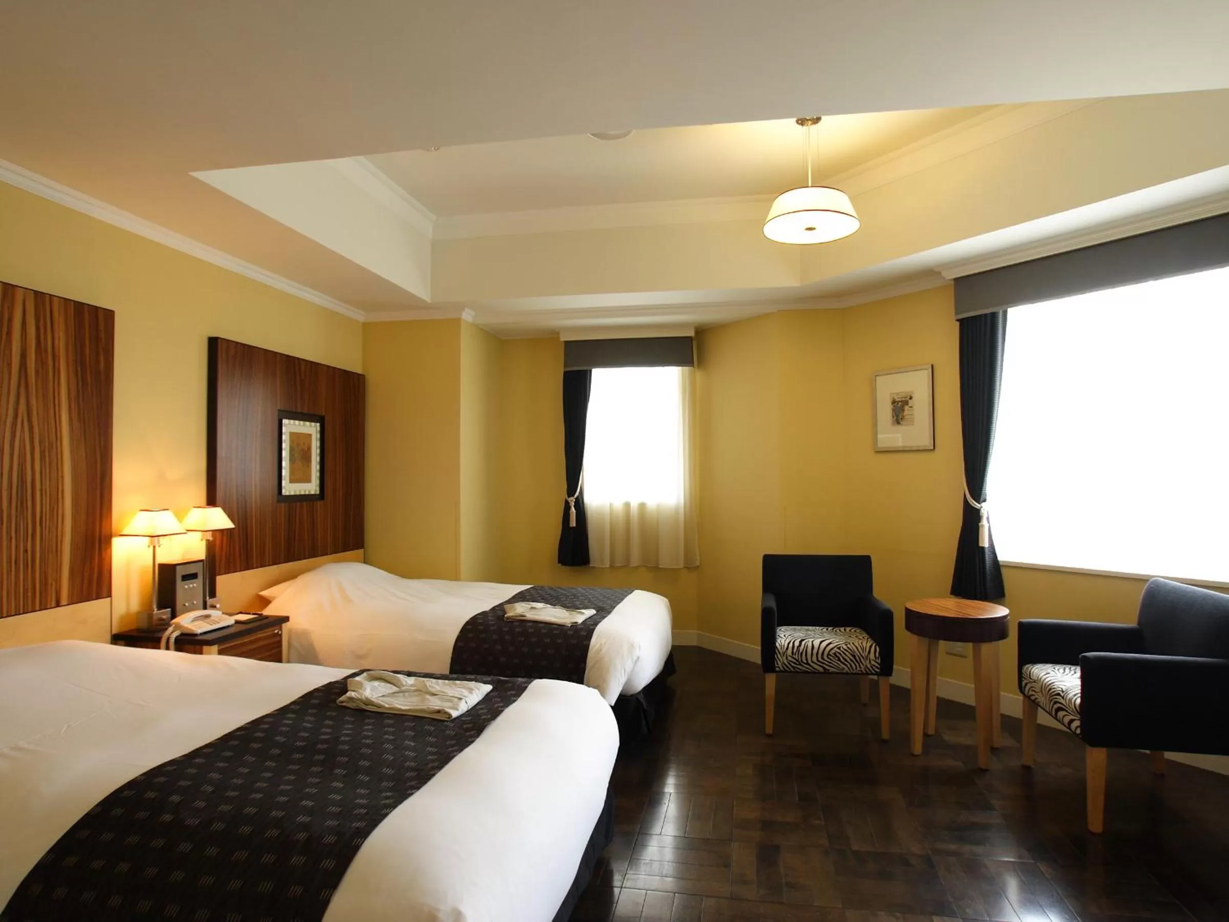 Photo of the whole room, Bed in Hotel Monterey La Soeur Fukuoka