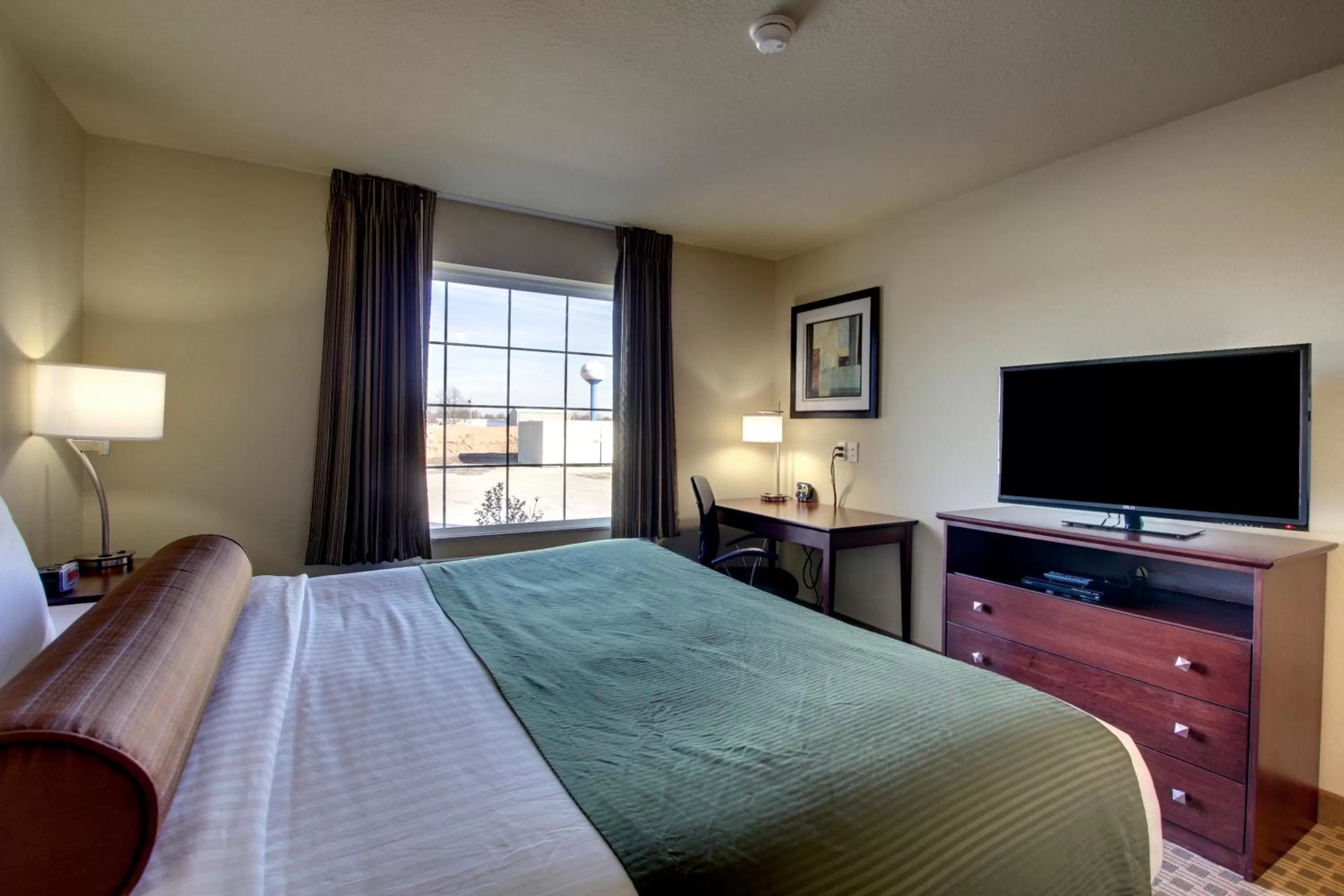 Bed in Cobblestone Inn & Suites - Rugby