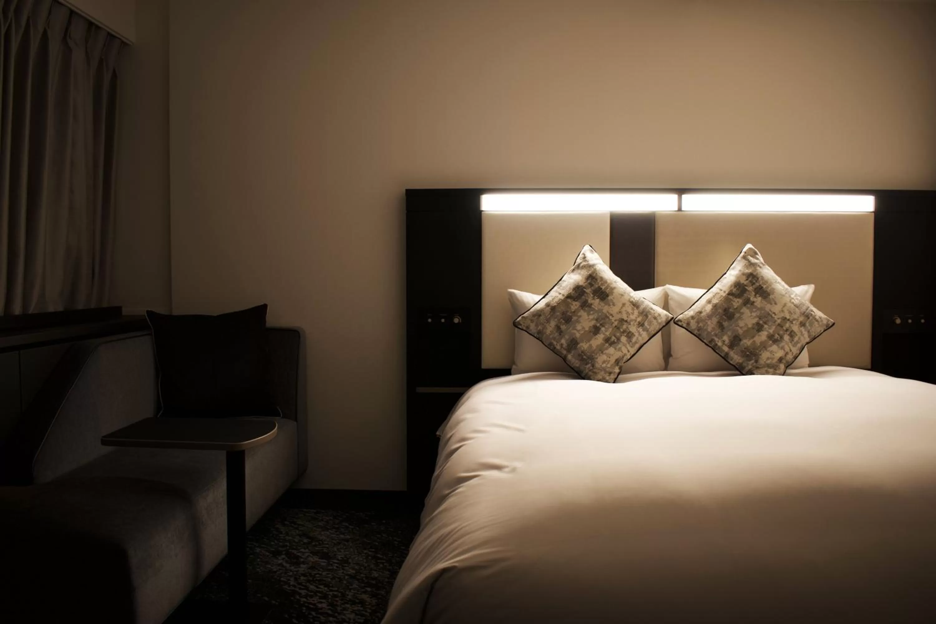 Bed in Cross Hotel Osaka