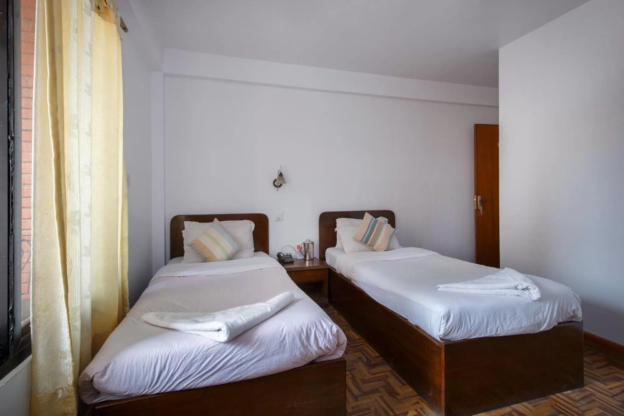 Bed in Pacific Guest House