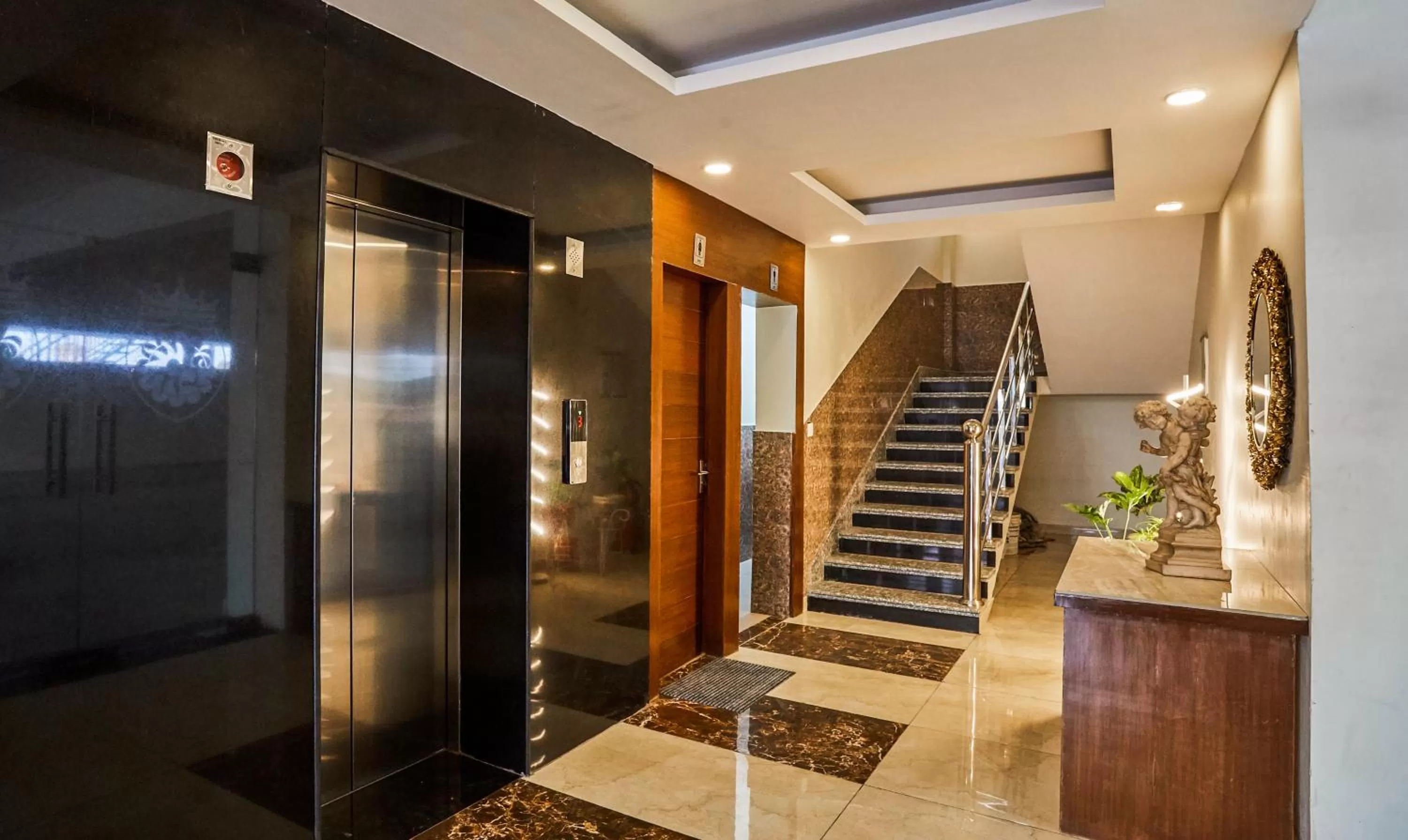 elevator in Treebo Grand Legacy Elite With Roof Top Cafe