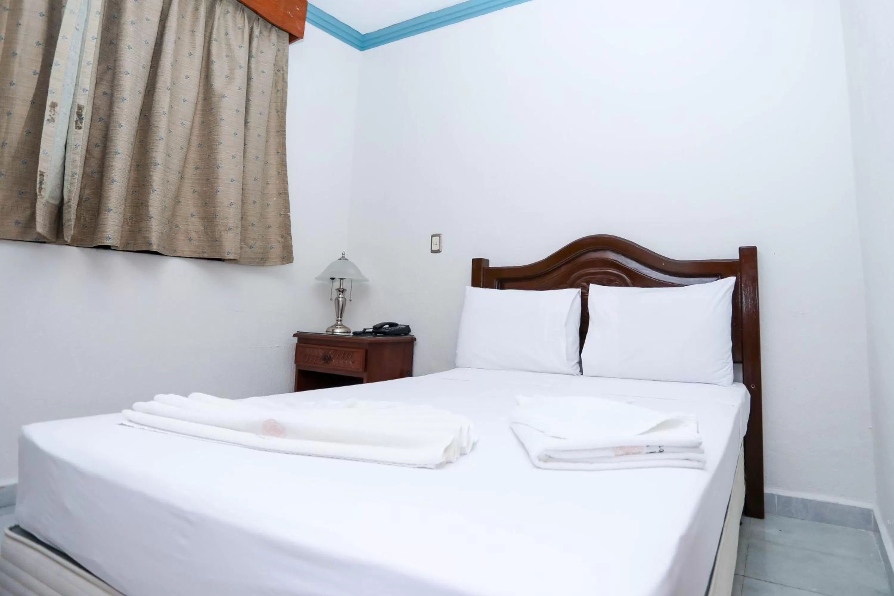 Bed in Hotel Avenida Cancun