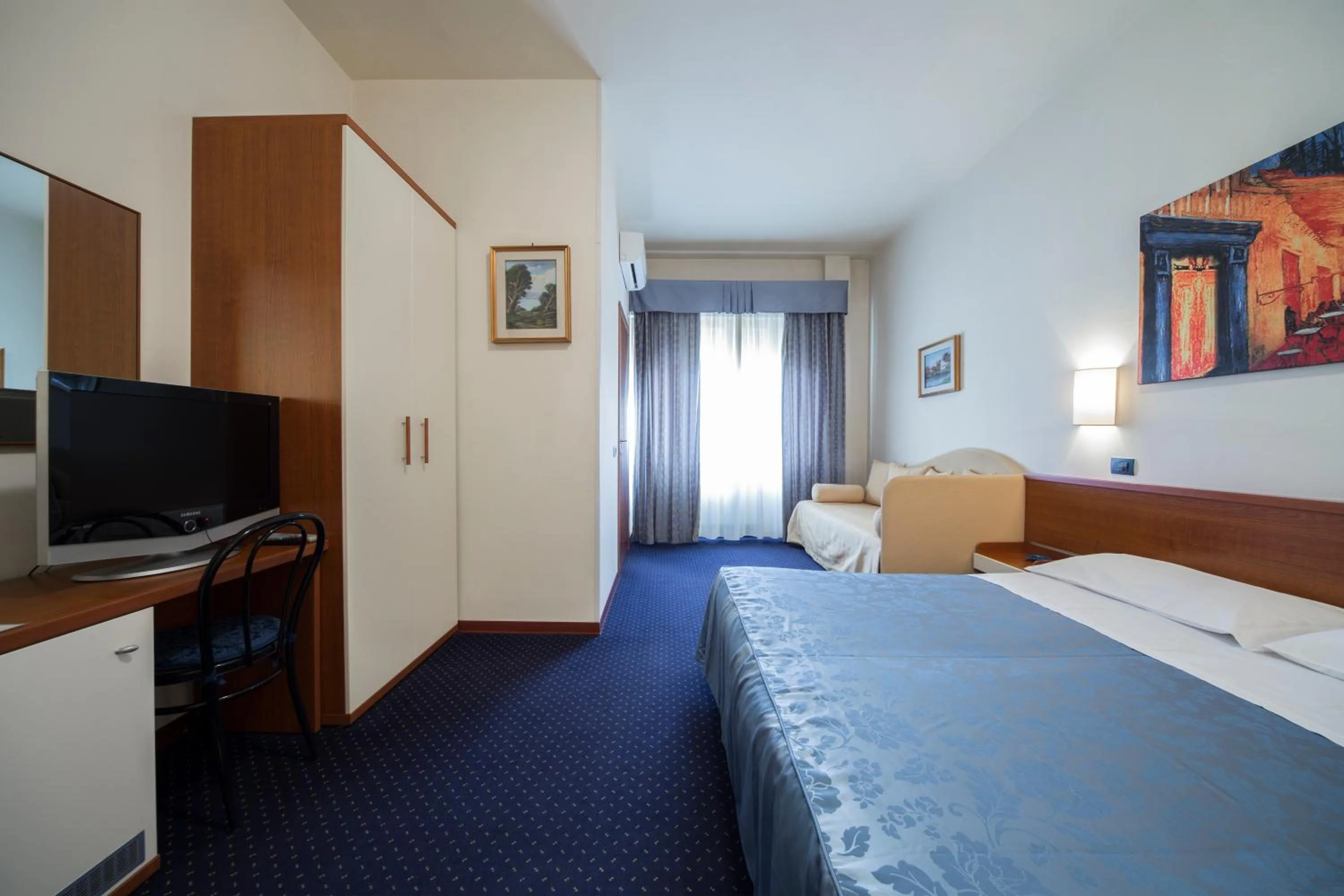 Bed in Hotel Elefante Bianco