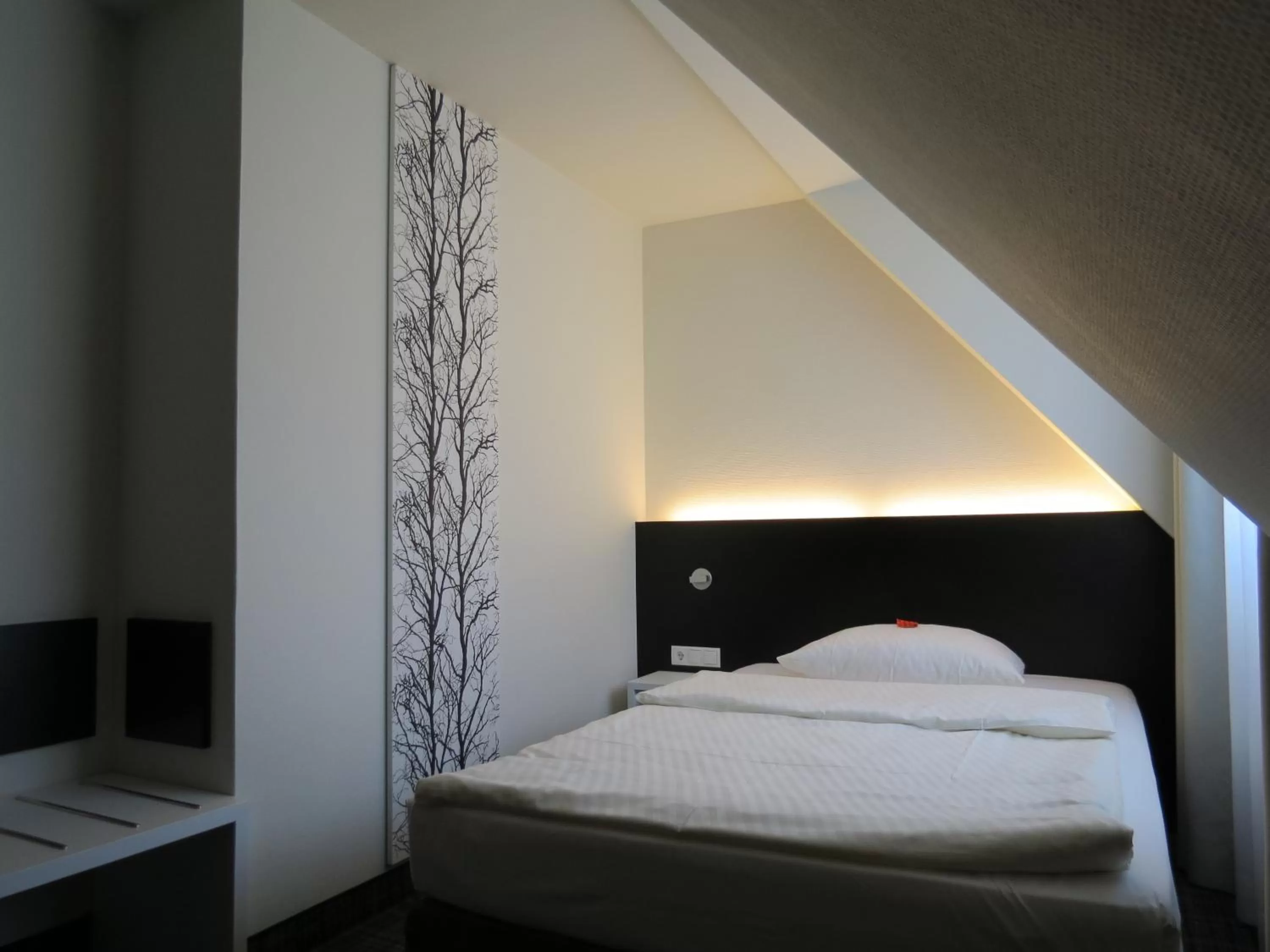 Bed in Comfor Hotel Ulm City