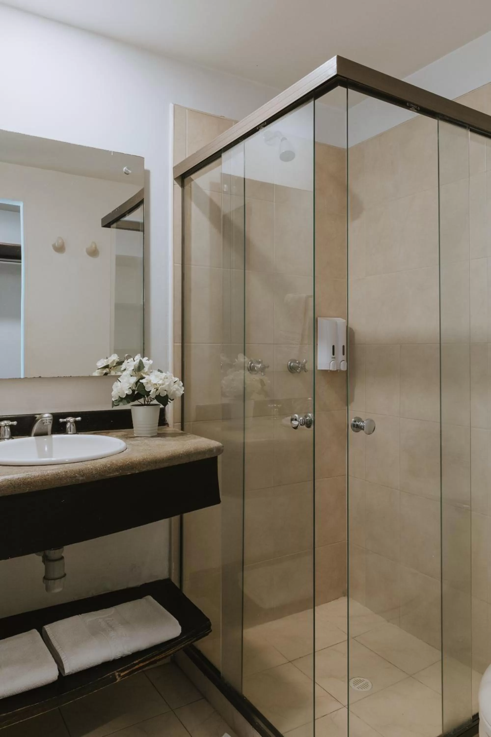 Bathroom in Travelers Orange Suites