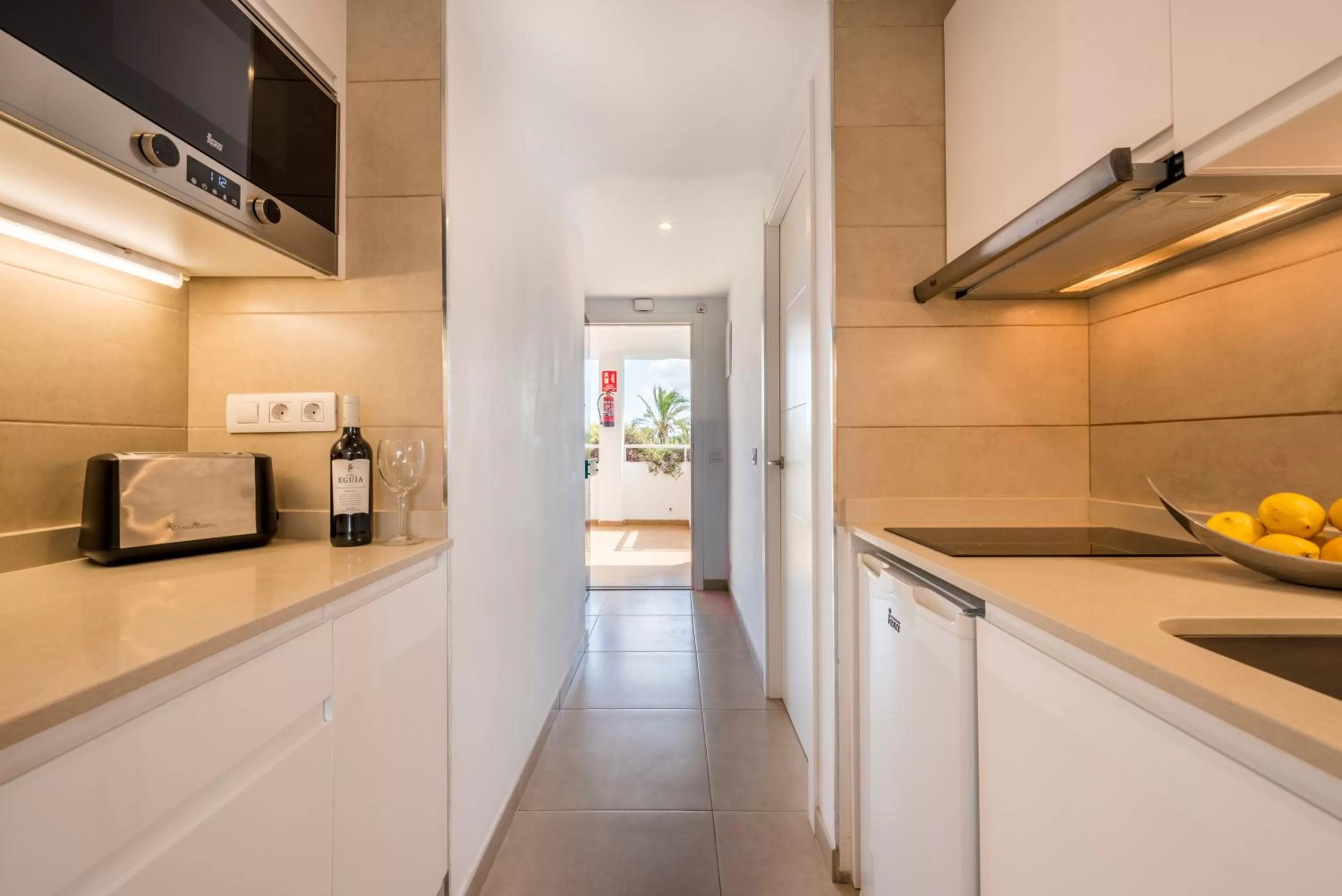 Kitchen or kitchenette in Camelina Suites