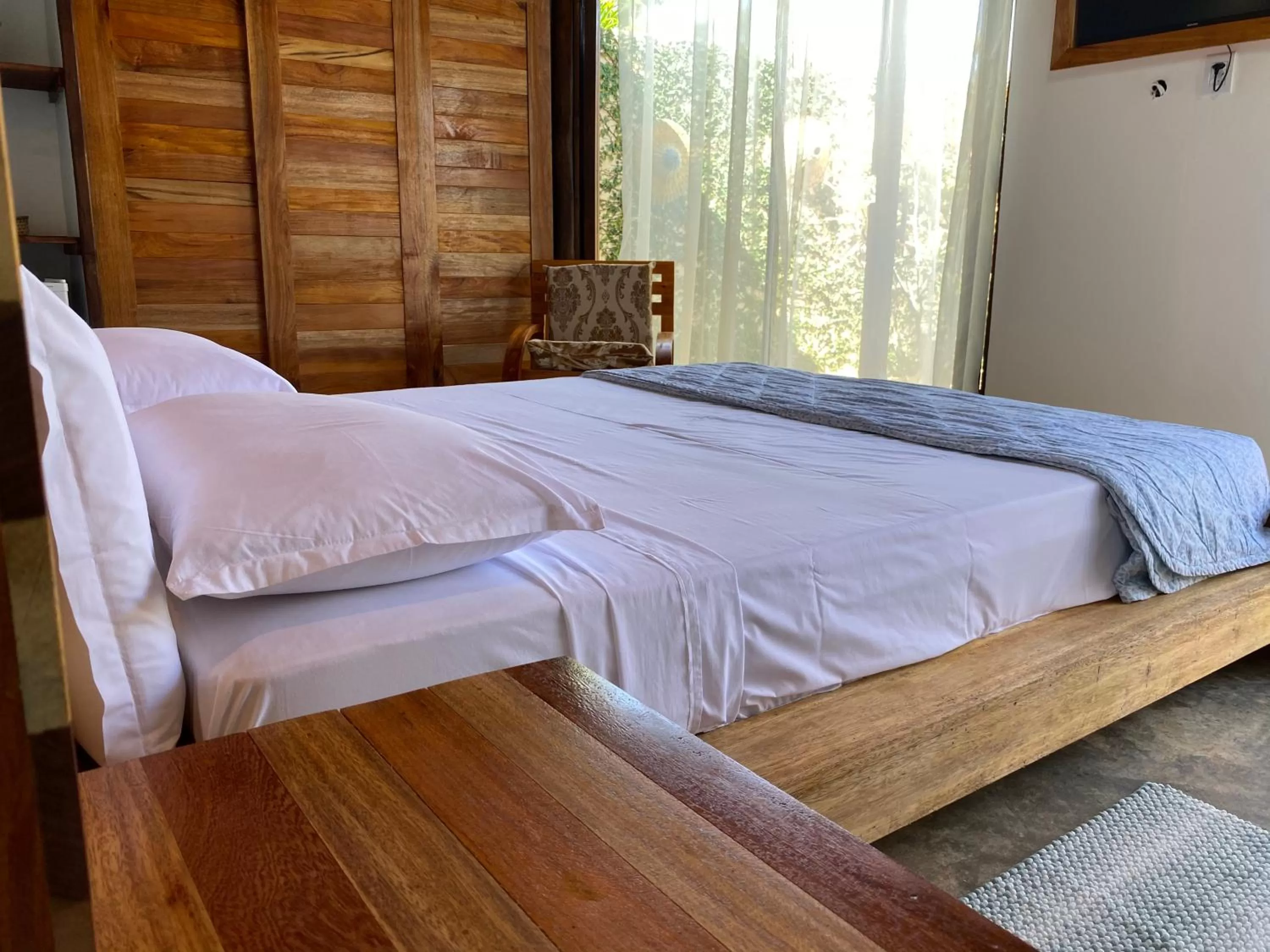 Bed in Pousada dos Hibiscus