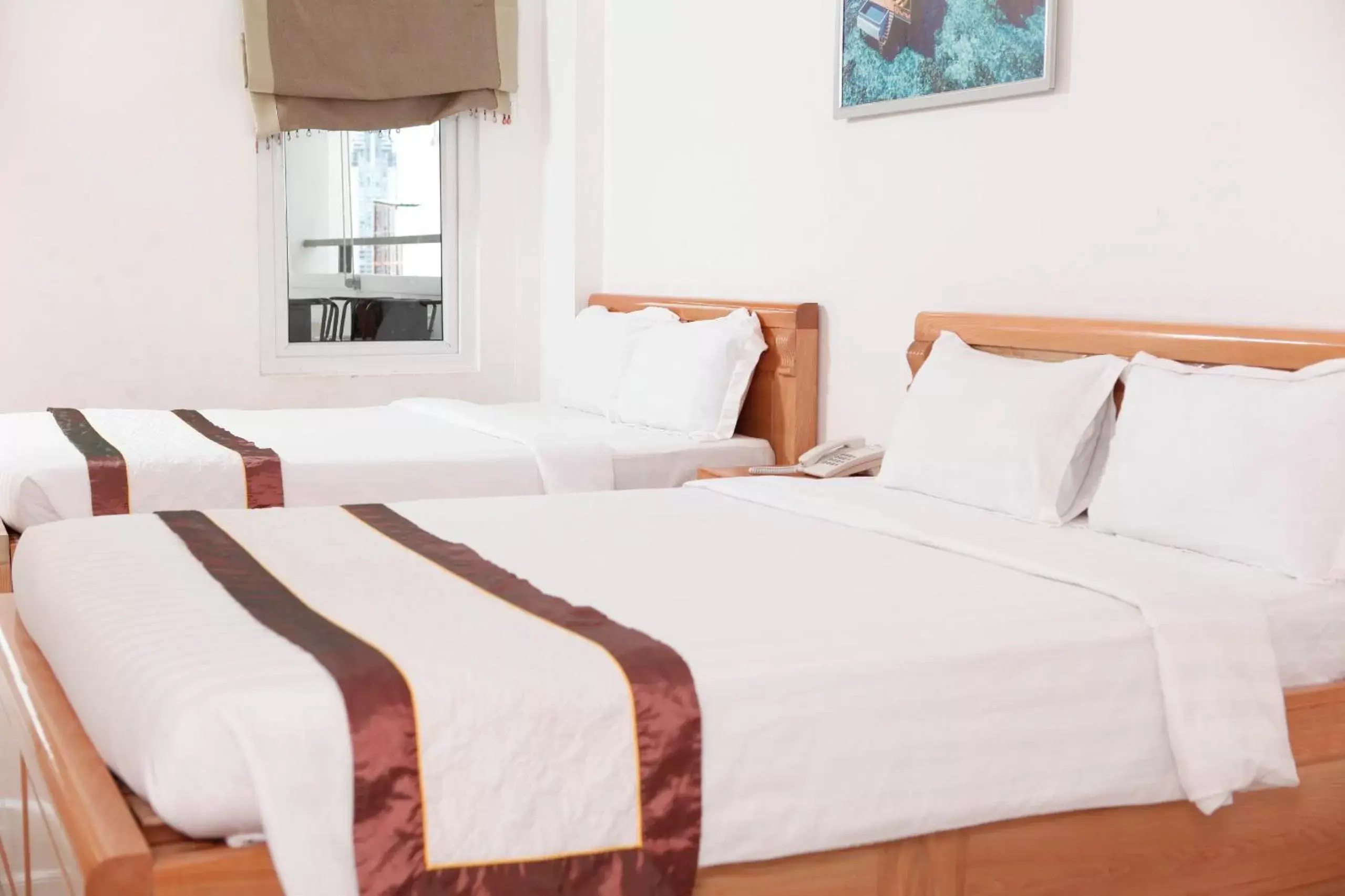 Deluxe Quadruple Room in CAROLINE BEACH VUNG TAU Deluxe Quadruple Room in CAROLINE BEACH VUNG TAU