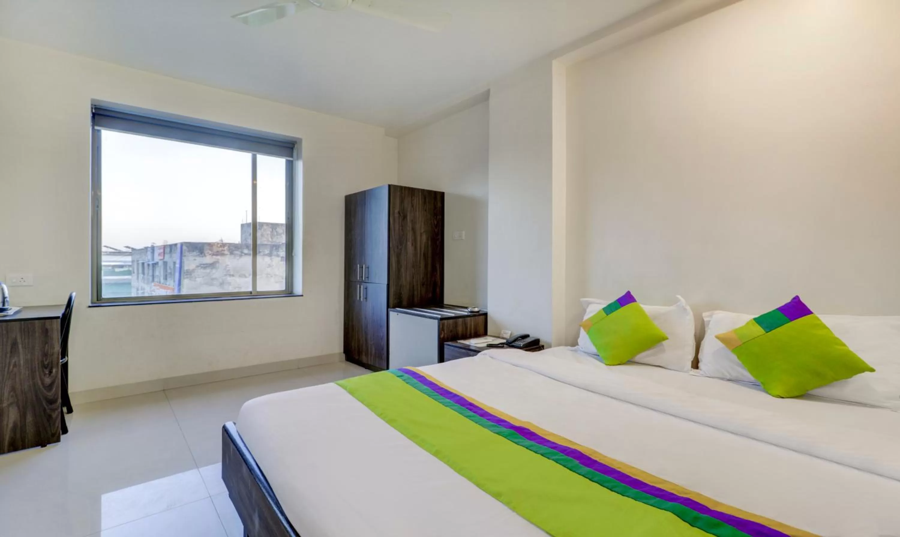 Bed in Treebo Trend Orange City