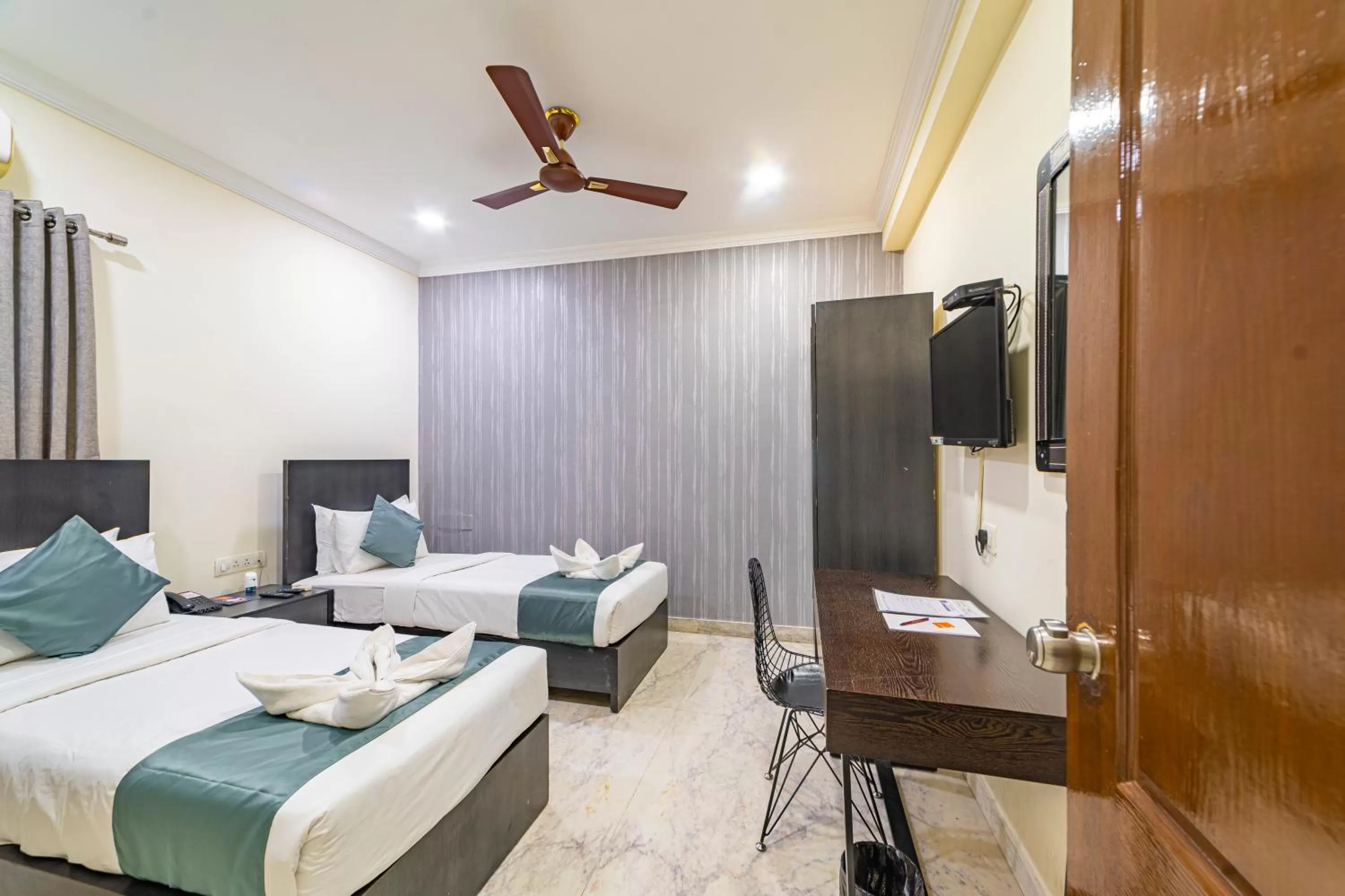 Bedroom, Bed in Hotel Athome & Serviced Apartments by Deccan Serai Hotels