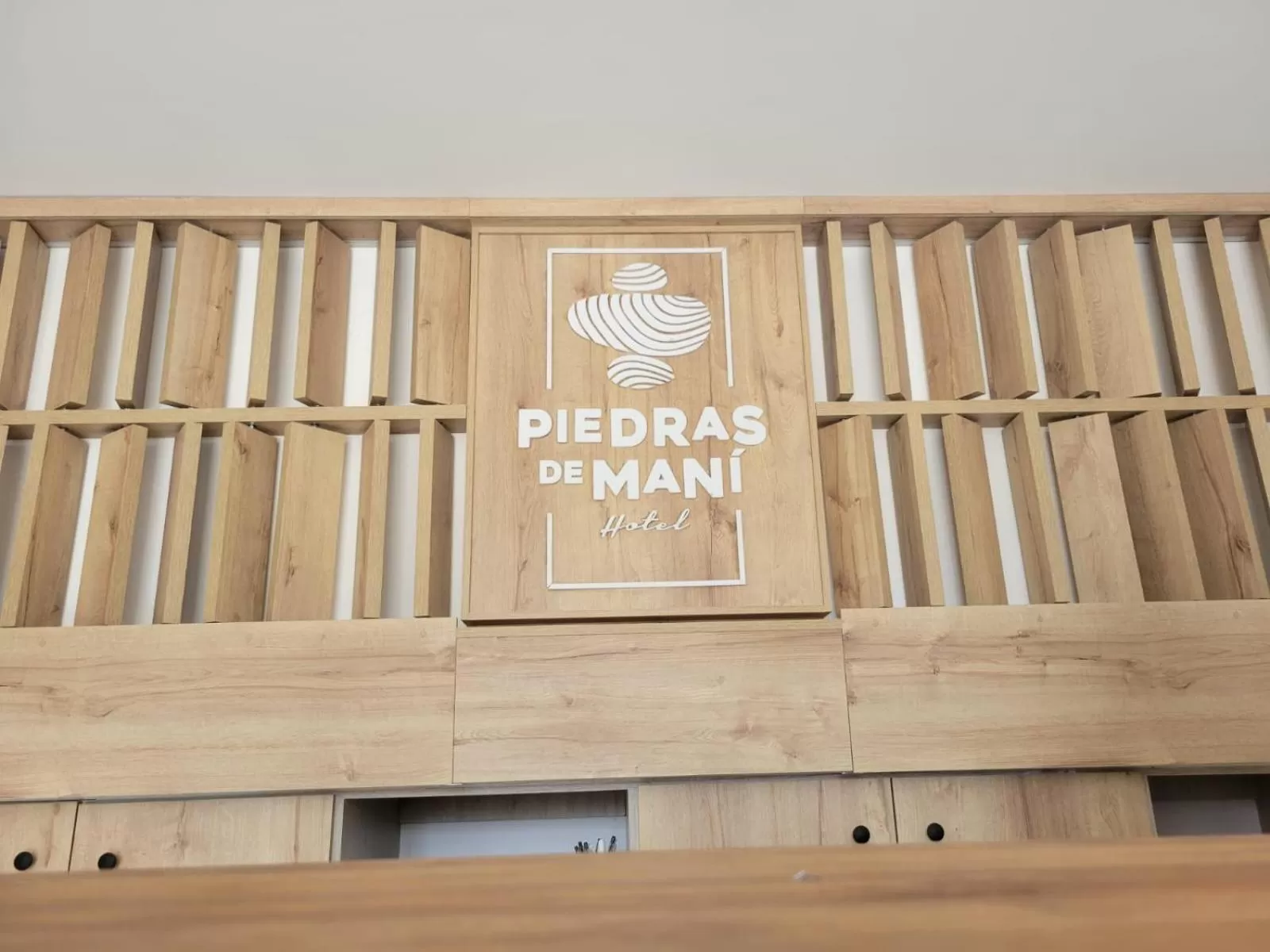 Property logo or sign in Hotel Piedras De Maní