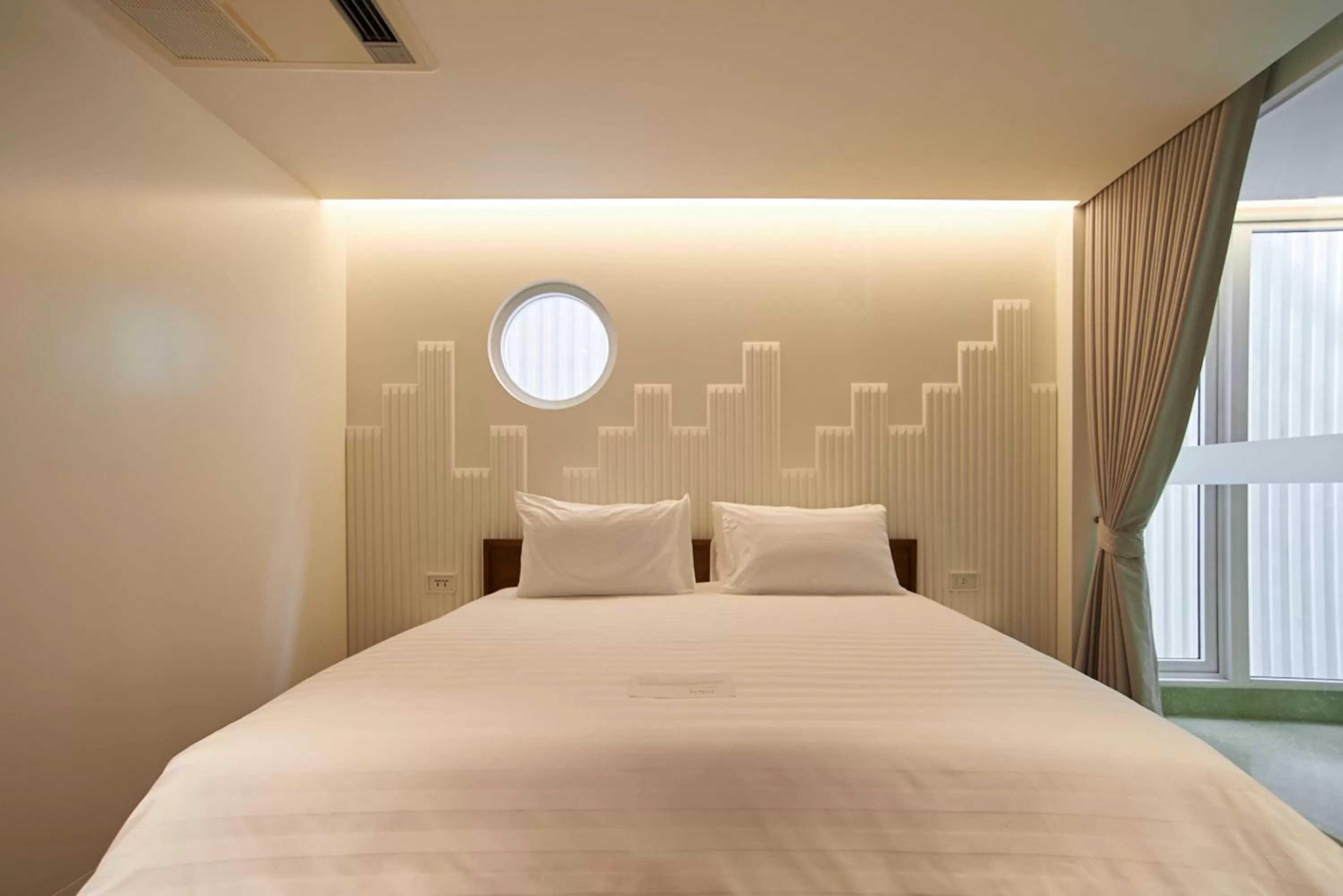 Bed in Bonsai Hotel Bangkok