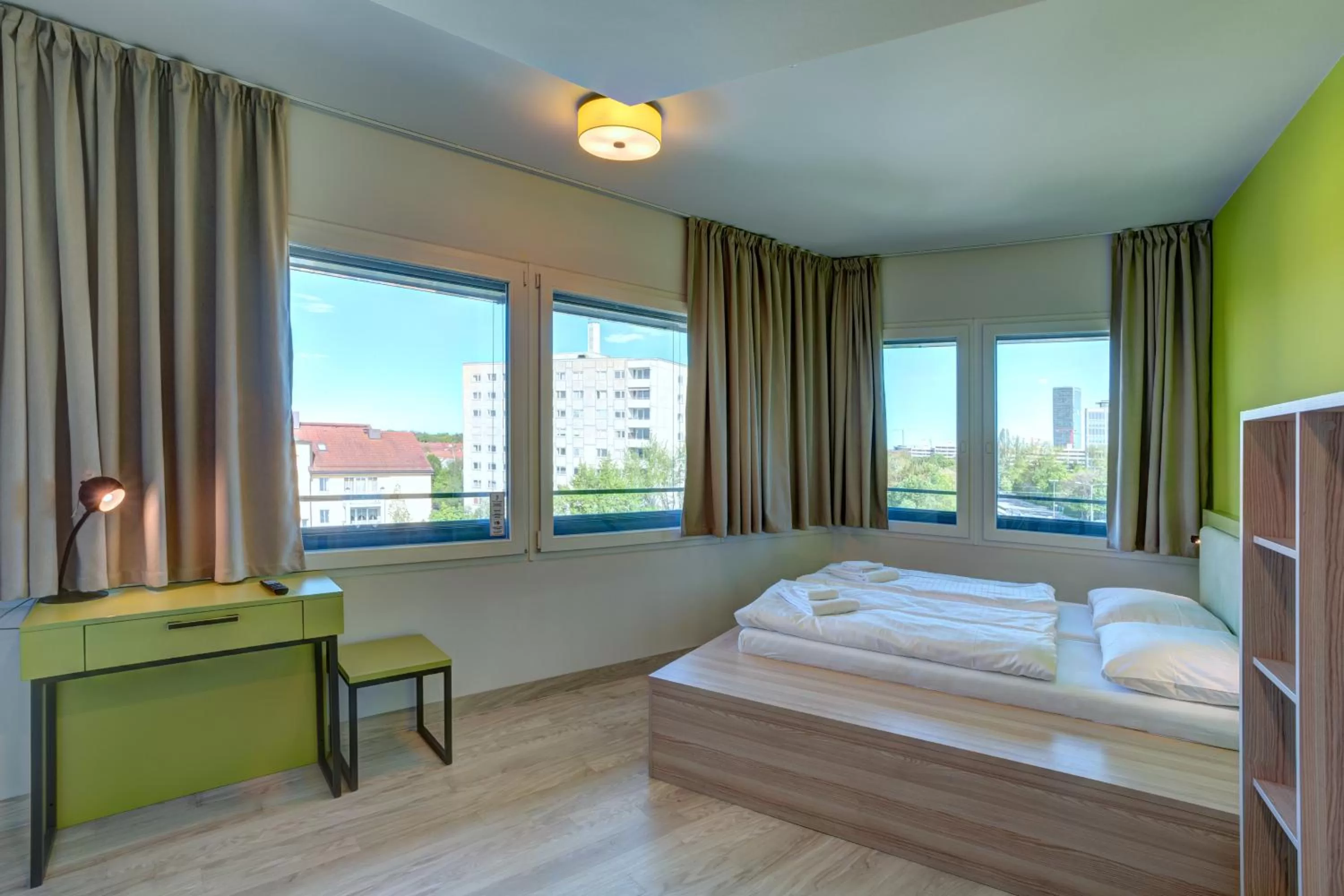 Photo of the whole room, Bed in MEININGER Hotel München Olympiapark