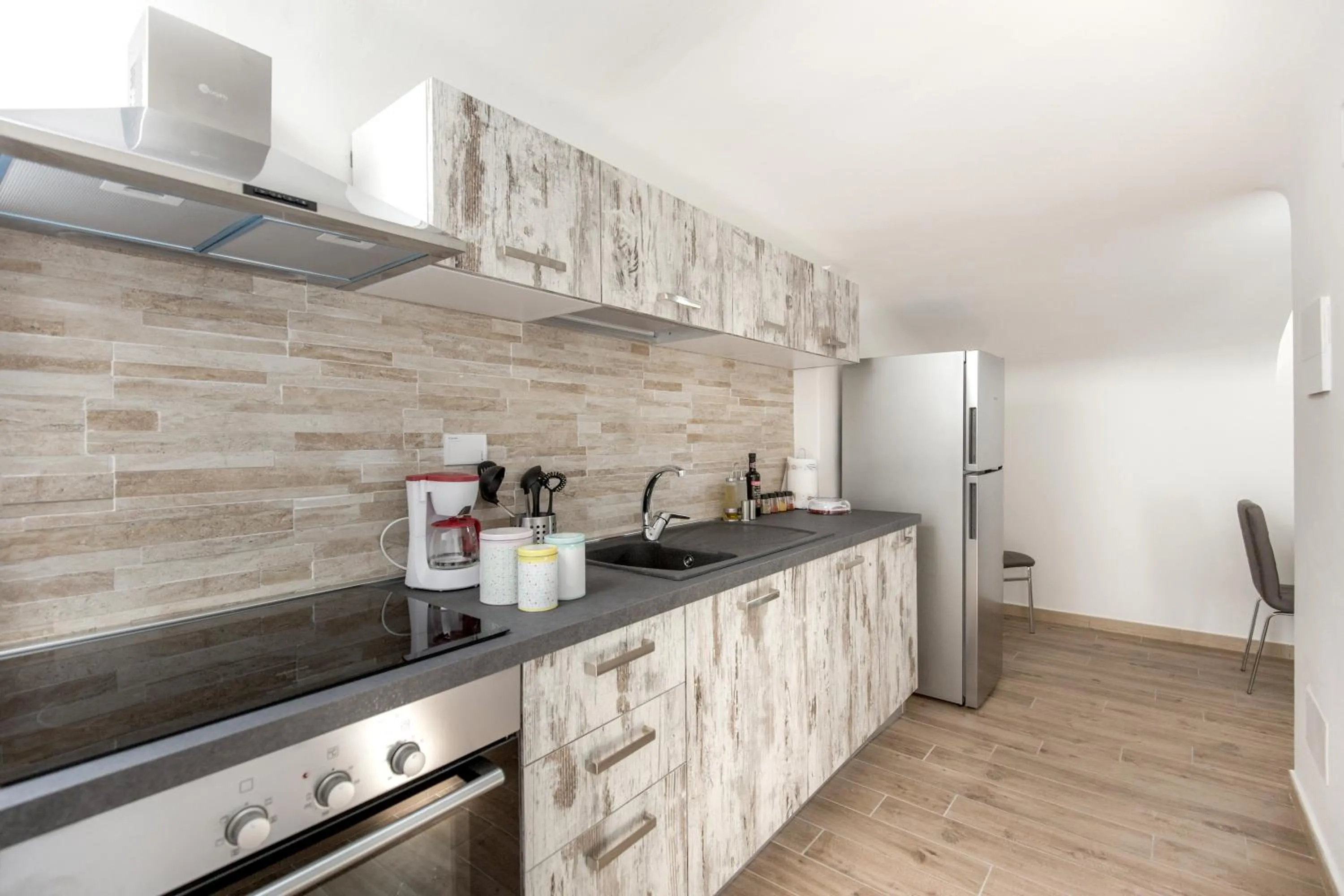 Kitchen or kitchenette in Apollo Guest House