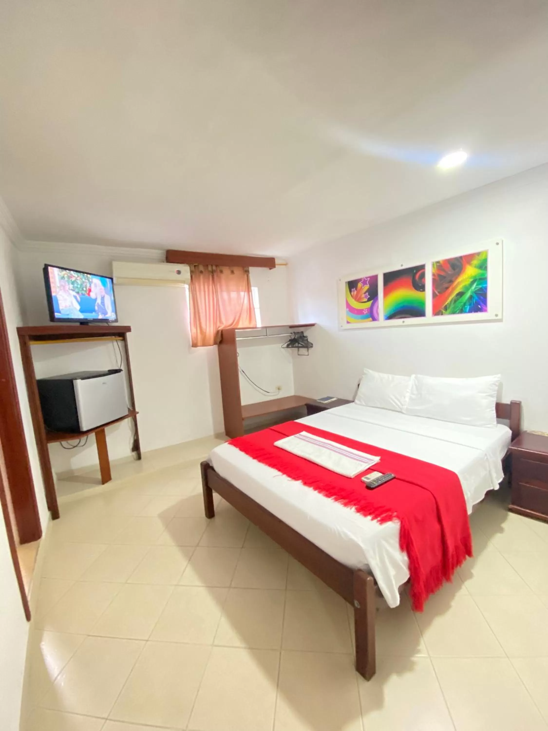 Communal lounge/ TV room, Bed in Hotel La Guajira