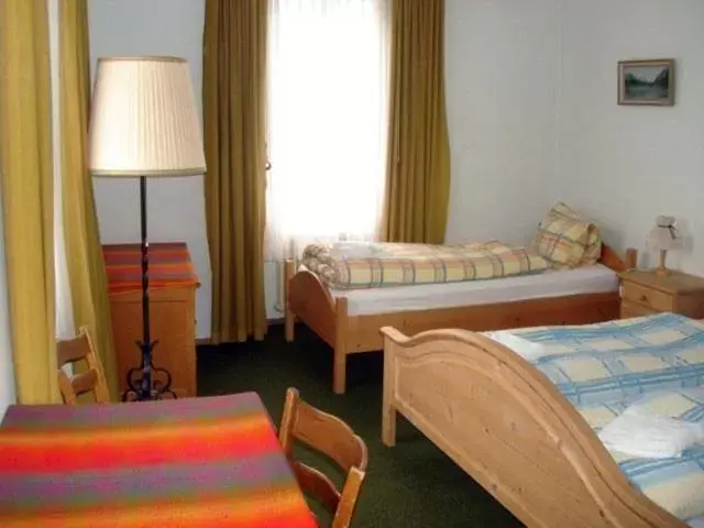 Triple Room with Shared Bathroom in Hotel Quellenhof Triple Room with Shared Bathroom in Hotel Quellenhof