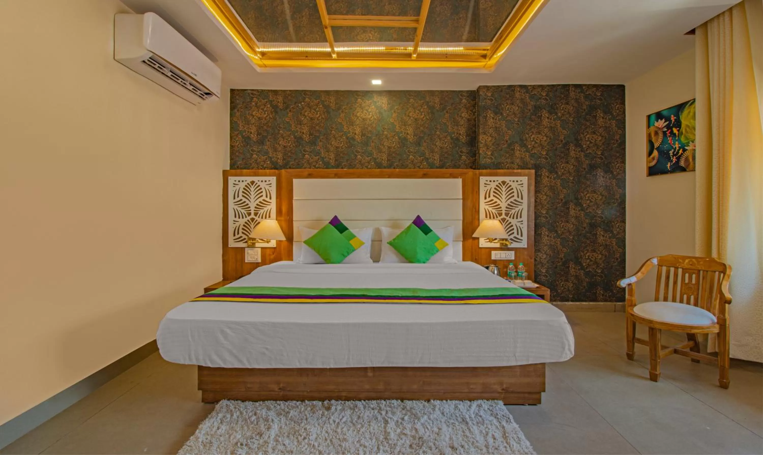 Bed in Treebo Trend Haveli Resort Roots Bhupatwala
