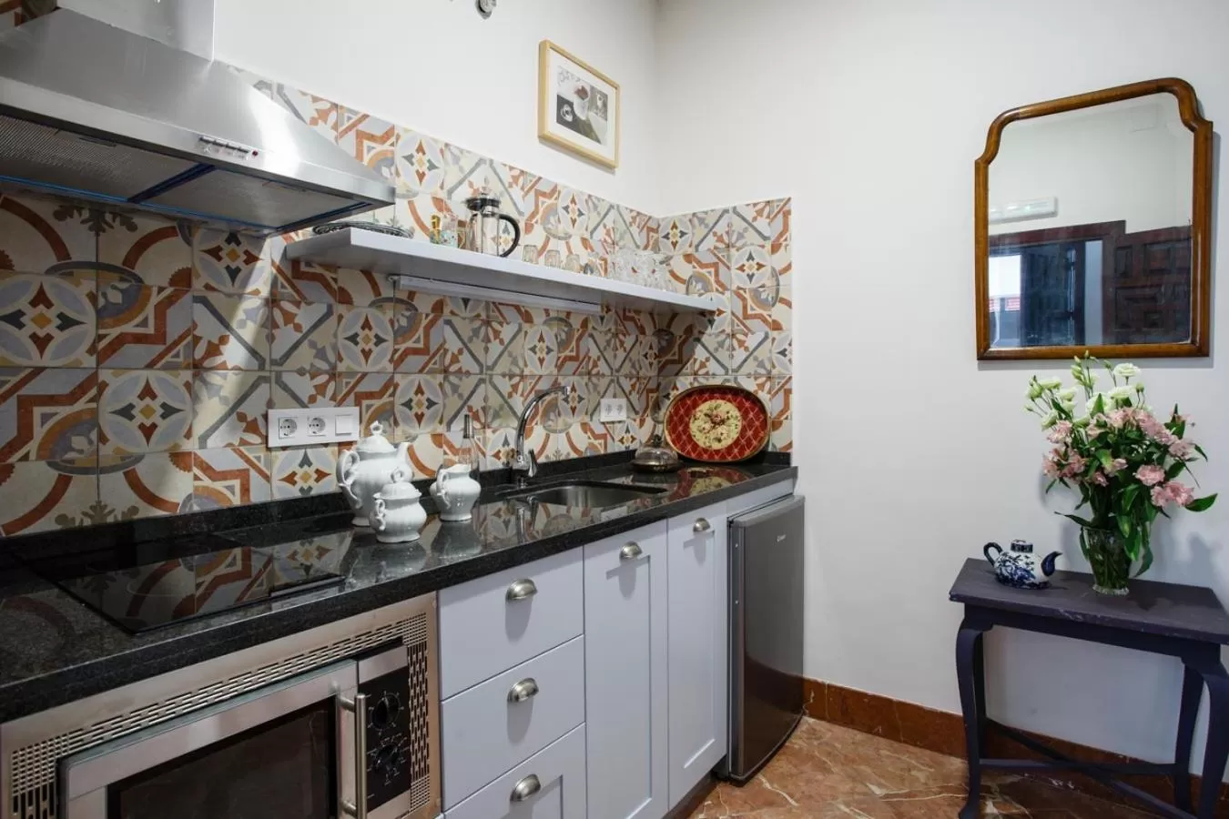 Kitchen or kitchenette in Suites Machado