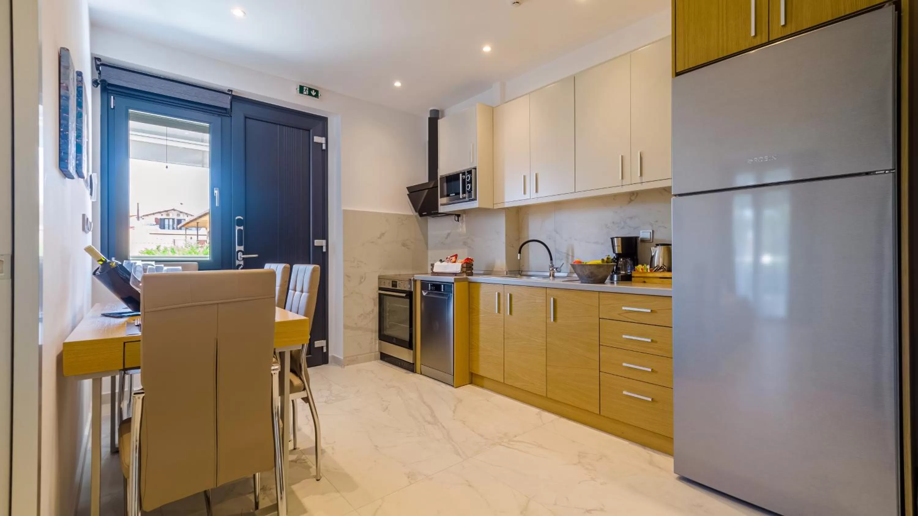 Kitchen or kitchenette in Kima Premium Apartments