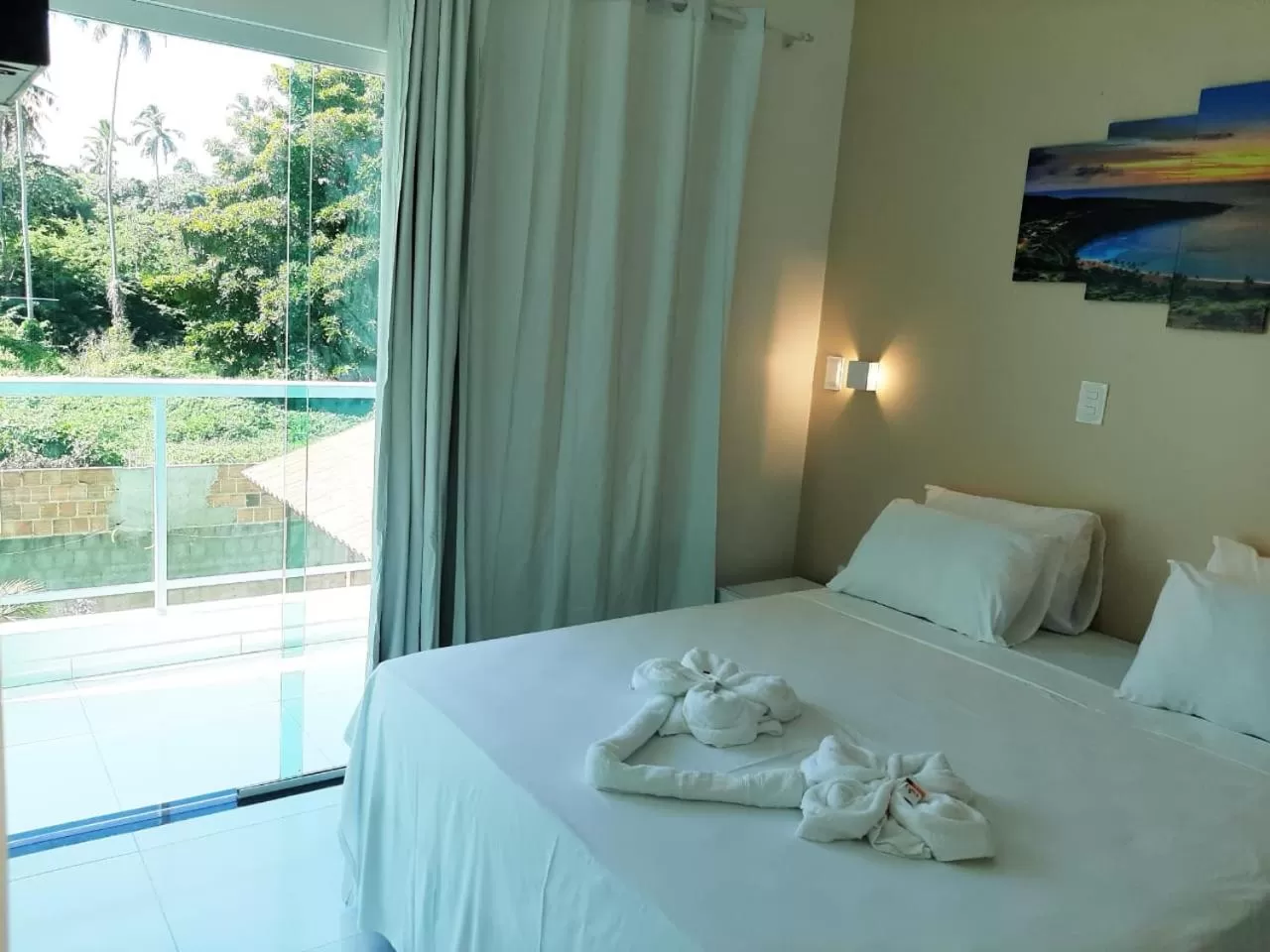 Bed in Pousada Concha Dourada