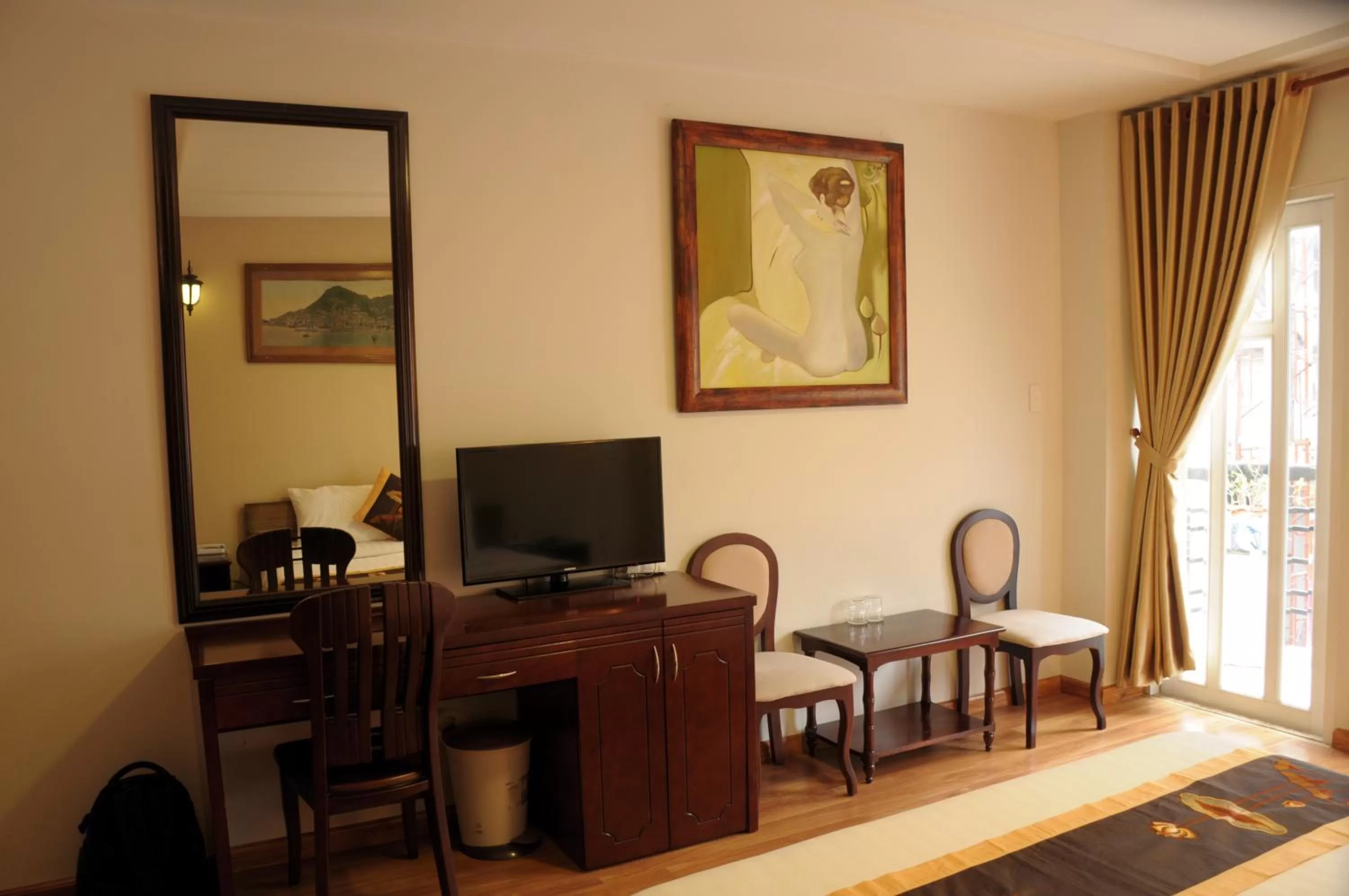 Communal lounge/ TV room in Saigon Amigo Hotel