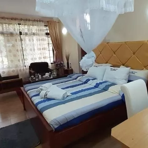 Bed in Vienna Woods Hotel Nakuru