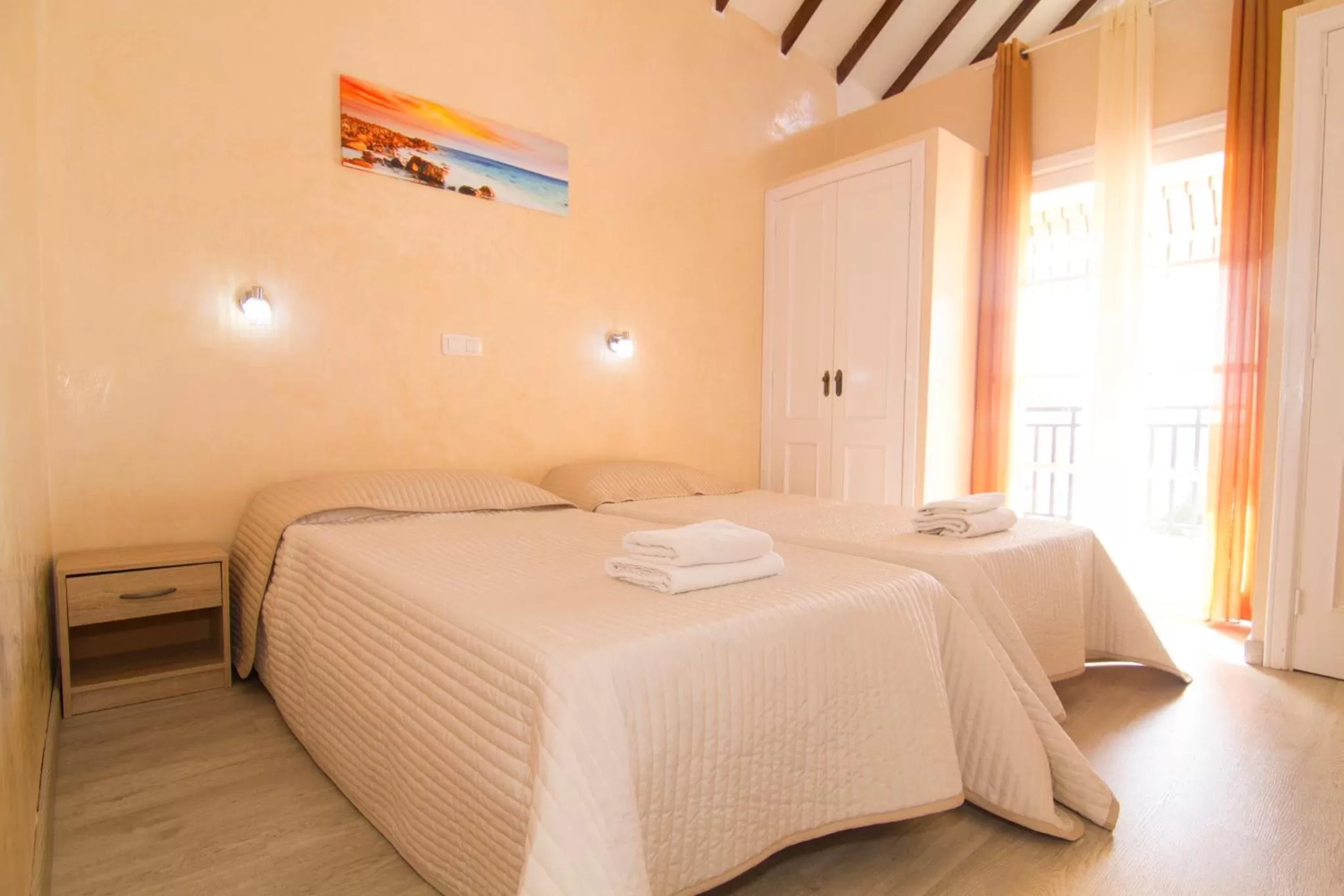 Bed in Yucca Park ApartHotel