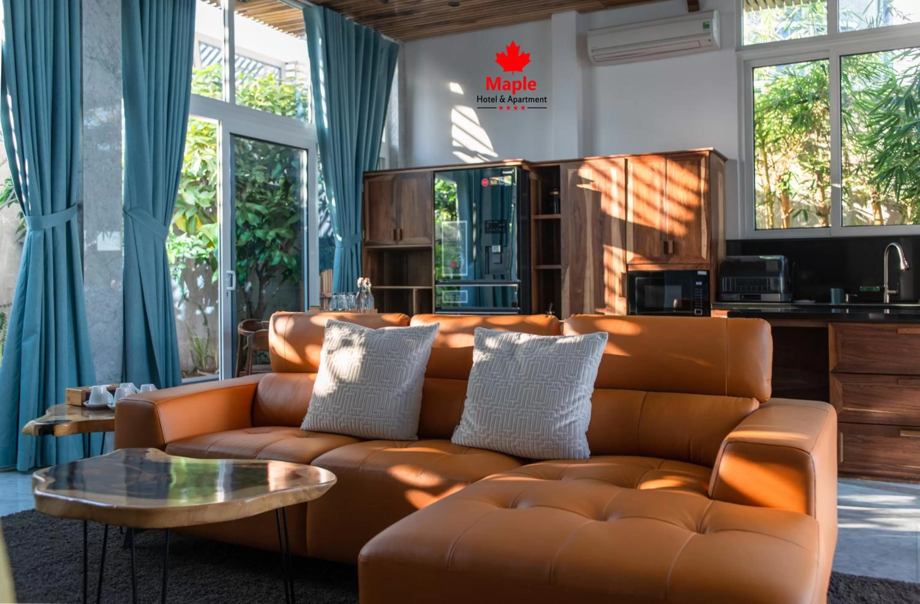 Kitchen or kitchenette in Maple Hotel & Apartment