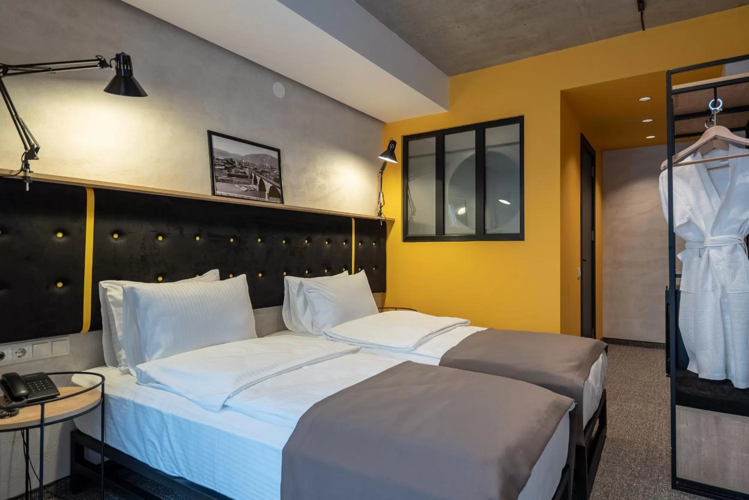 Photo of the whole room, Bed in Tbilisi Story Hotel