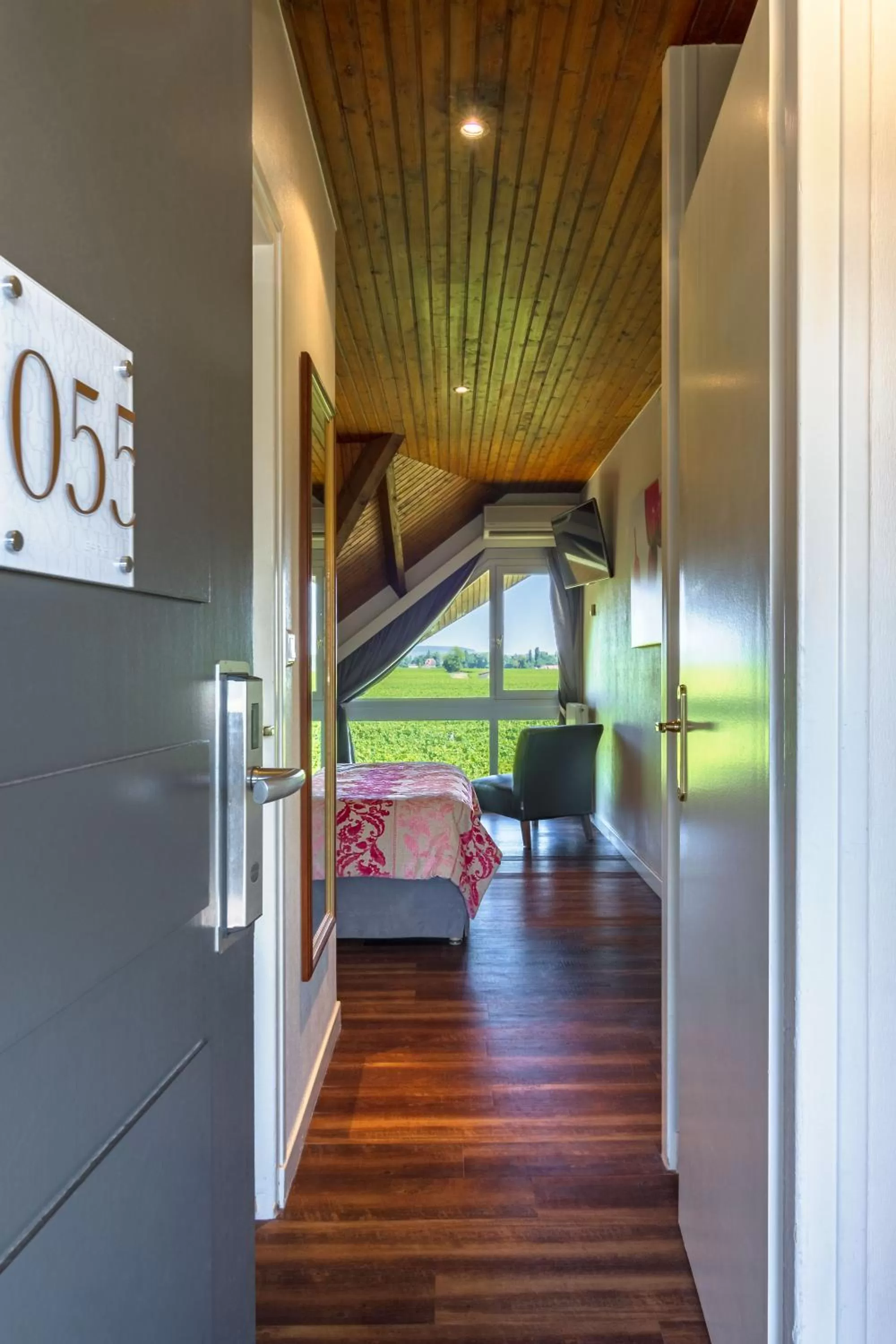 View (from property/room), Bed in Kyriad Prestige Beaune le Panorama