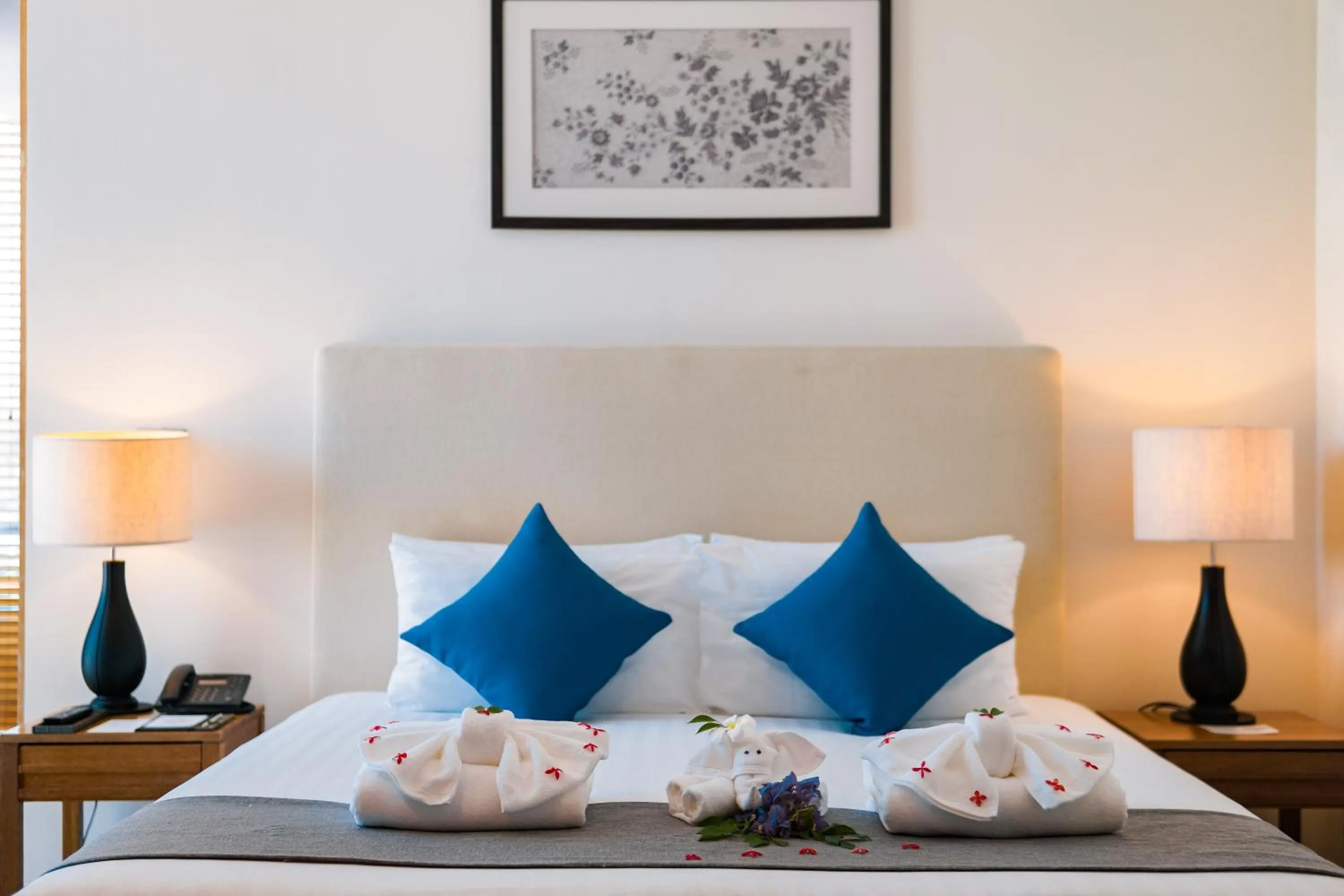 Bed in Splash Beach Resort Phuket Family-Friendly Water Park Resort Near Phuket Airport