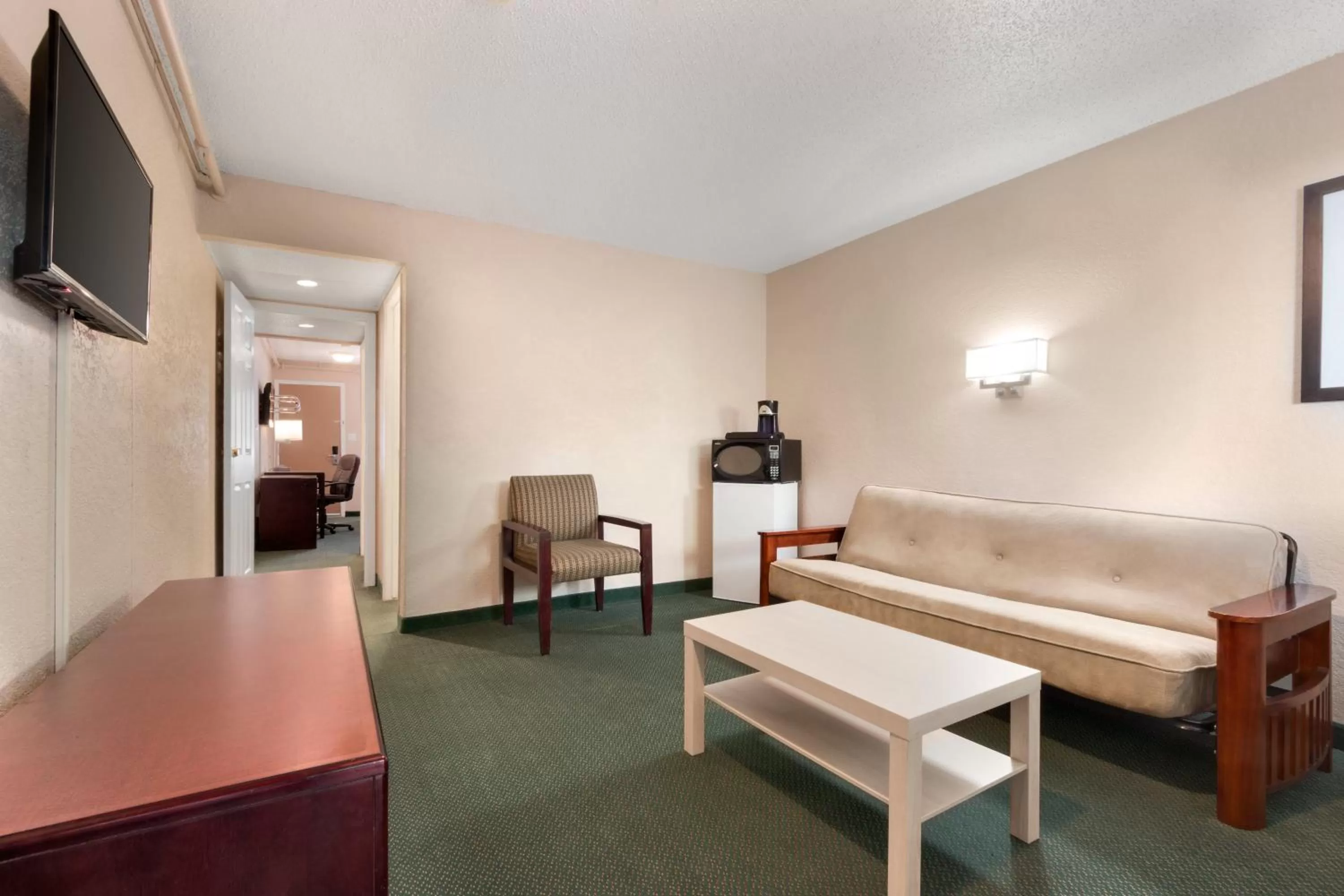 Living room in Days Inn by Wyndham Lethbridge